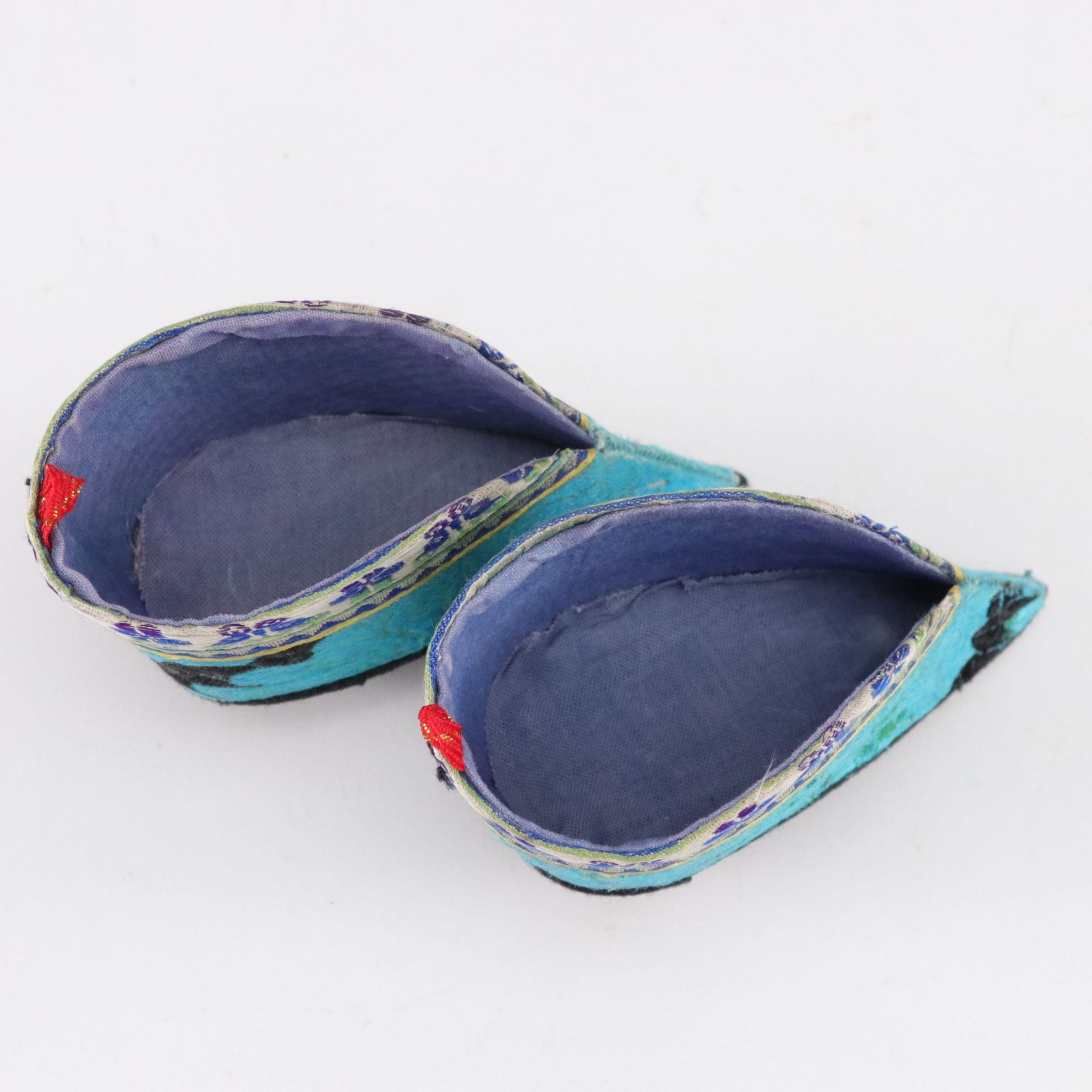 Basket Containing Silk Chinese Shoes, Baby Bonnet, Linens and More