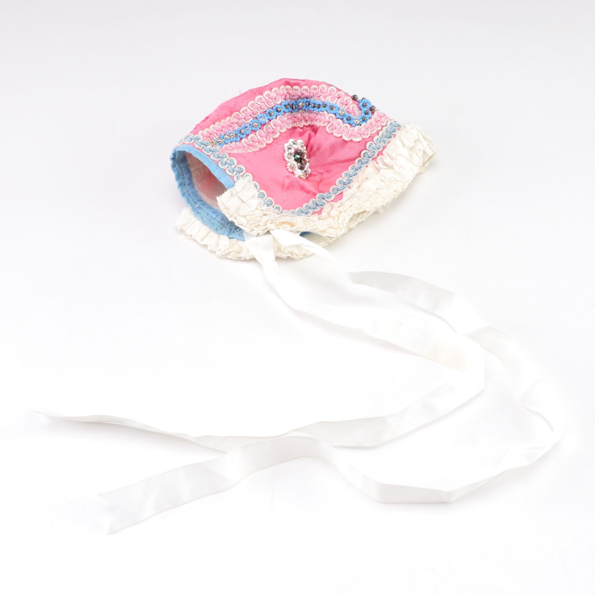 Basket Containing Silk Chinese Shoes, Baby Bonnet, Linens and More