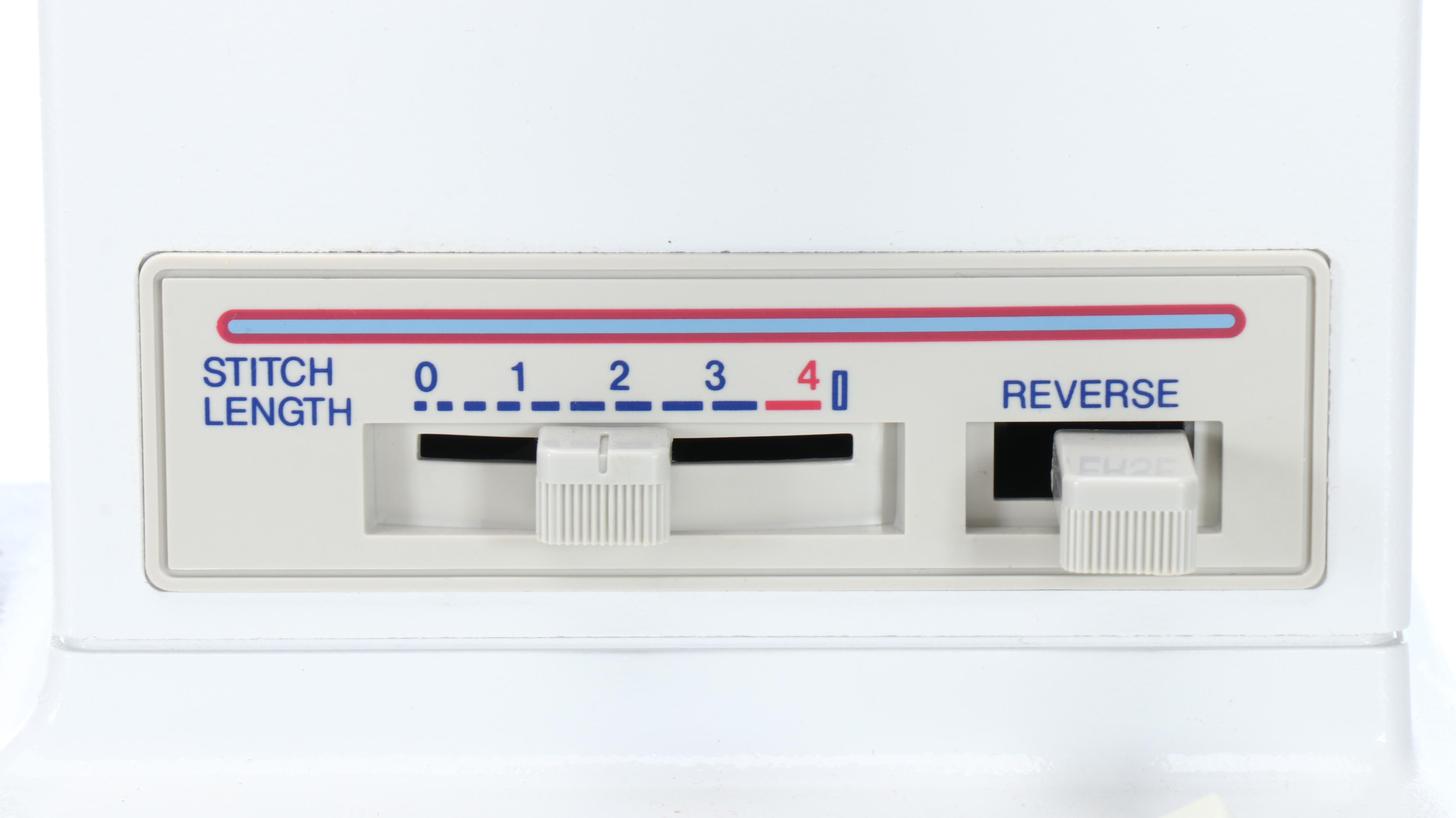 Singer Model 9410 Sewing Machine with Paper Trimmer and Supply Chest