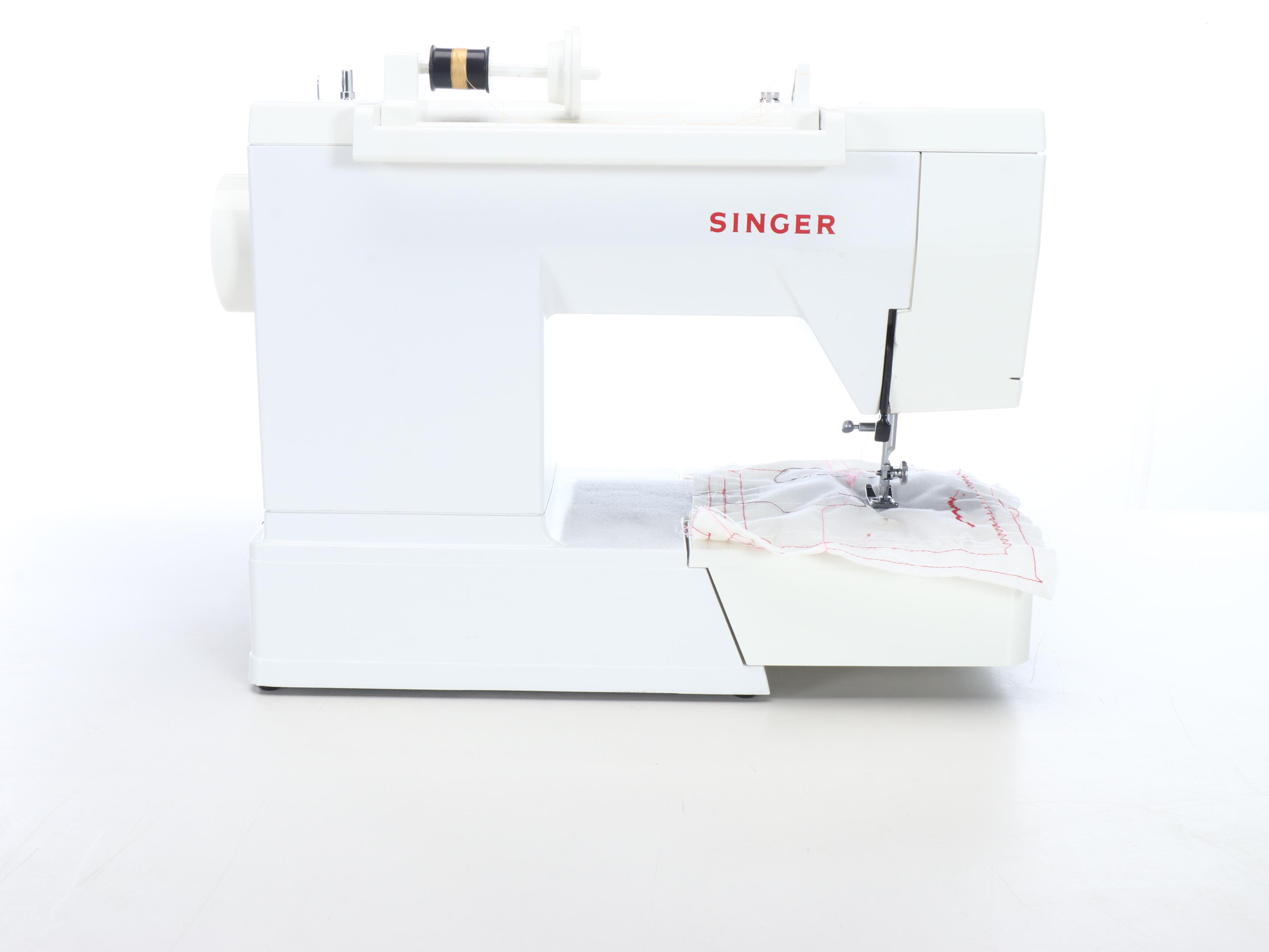 Singer Model 9410 Sewing Machine with Paper Trimmer and Supply Chest