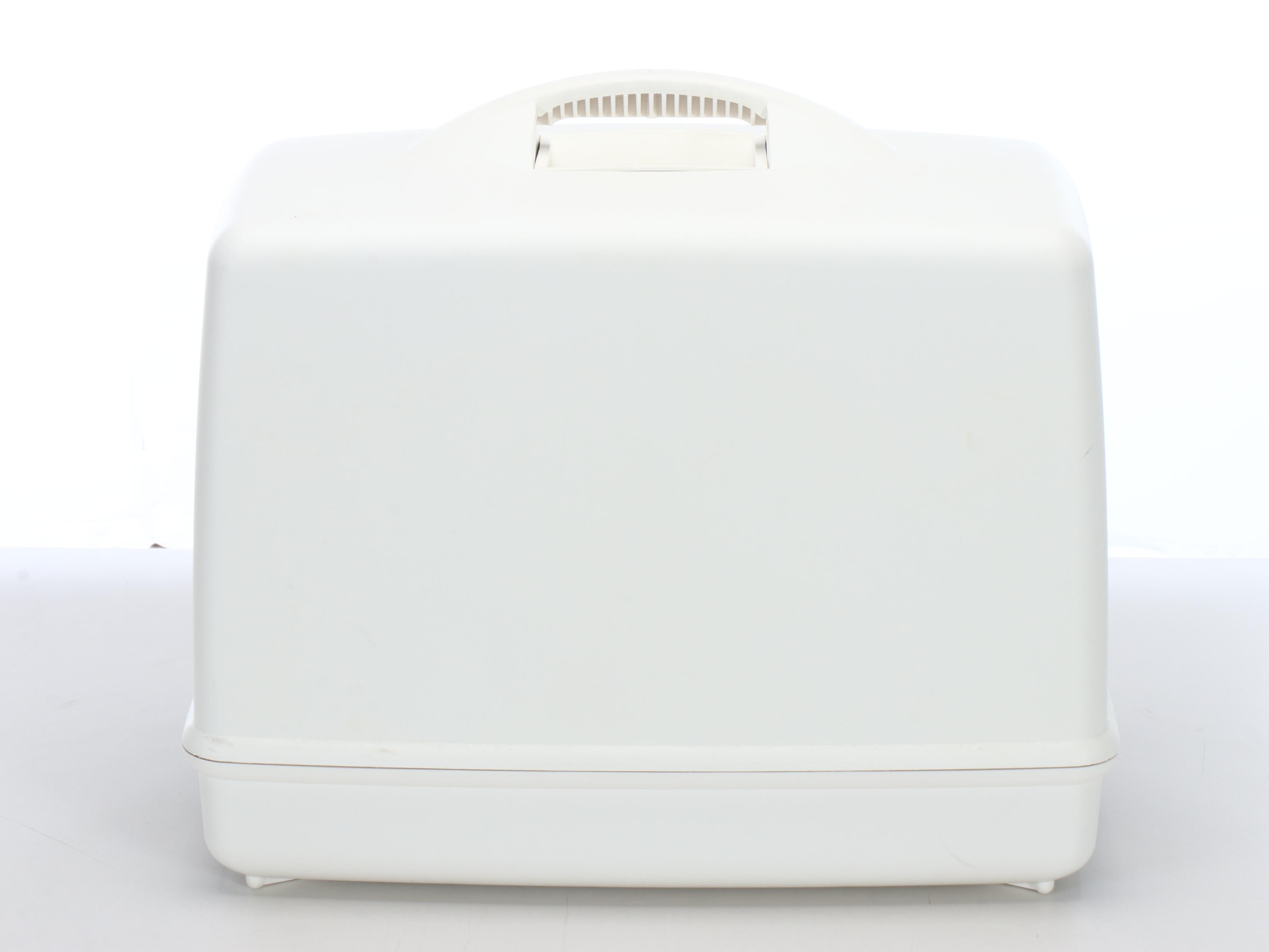 Singer Model 9410 Sewing Machine with Paper Trimmer and Supply Chest