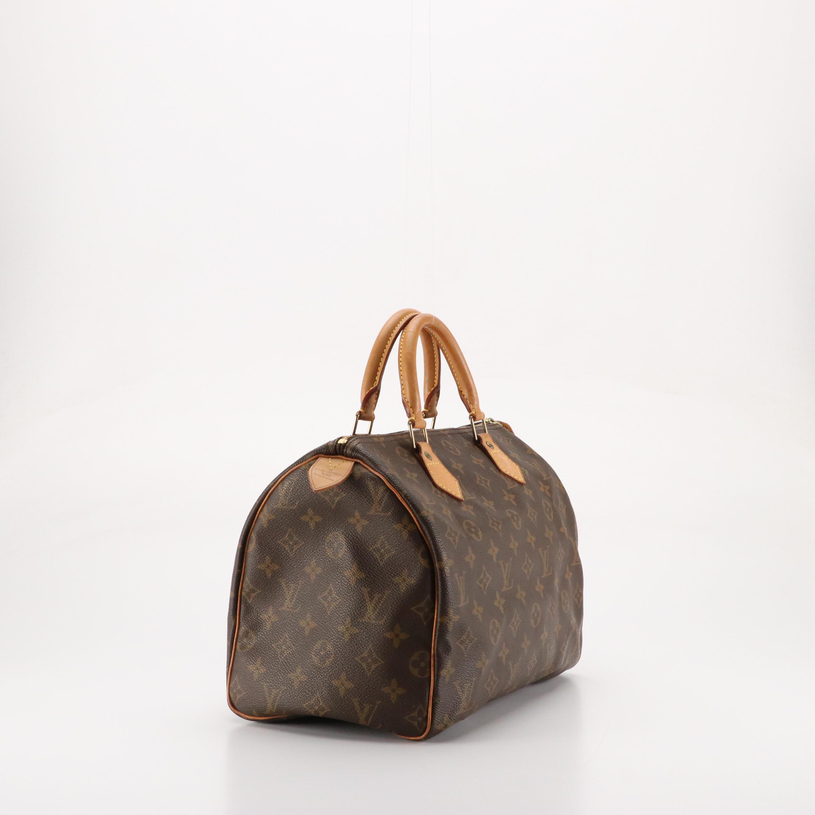 Louis Vuitton Speedy 30 Handbag in Monogram Canvas and Leather Trim