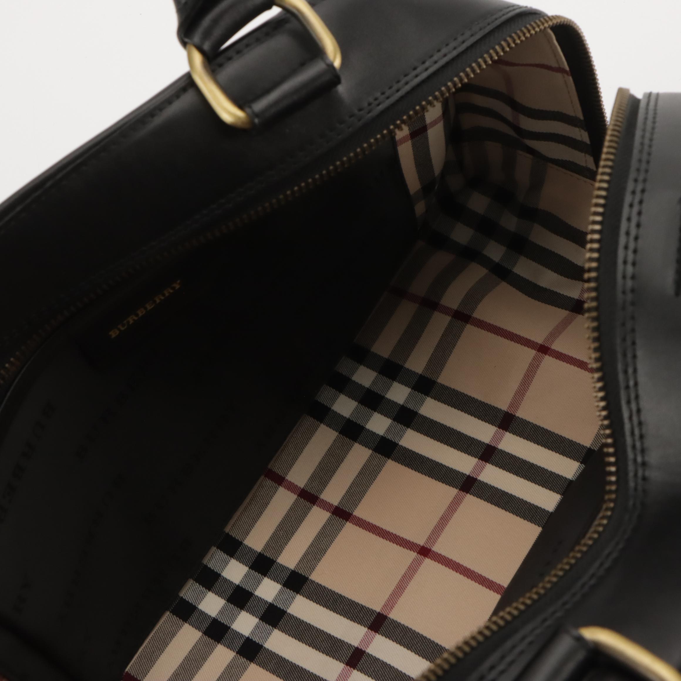 Burberry Domed Zip-Around Handbag in Black Calfskin Leather