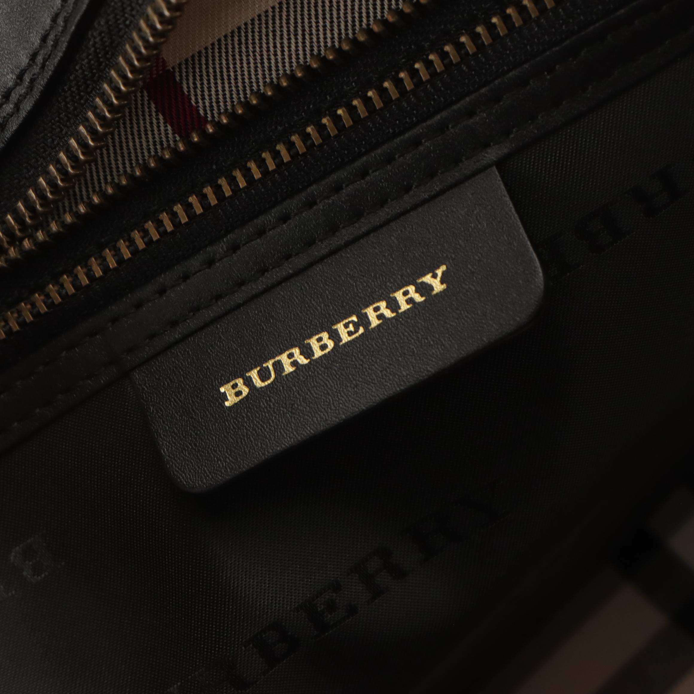 Burberry Domed Zip-Around Handbag in Black Calfskin Leather