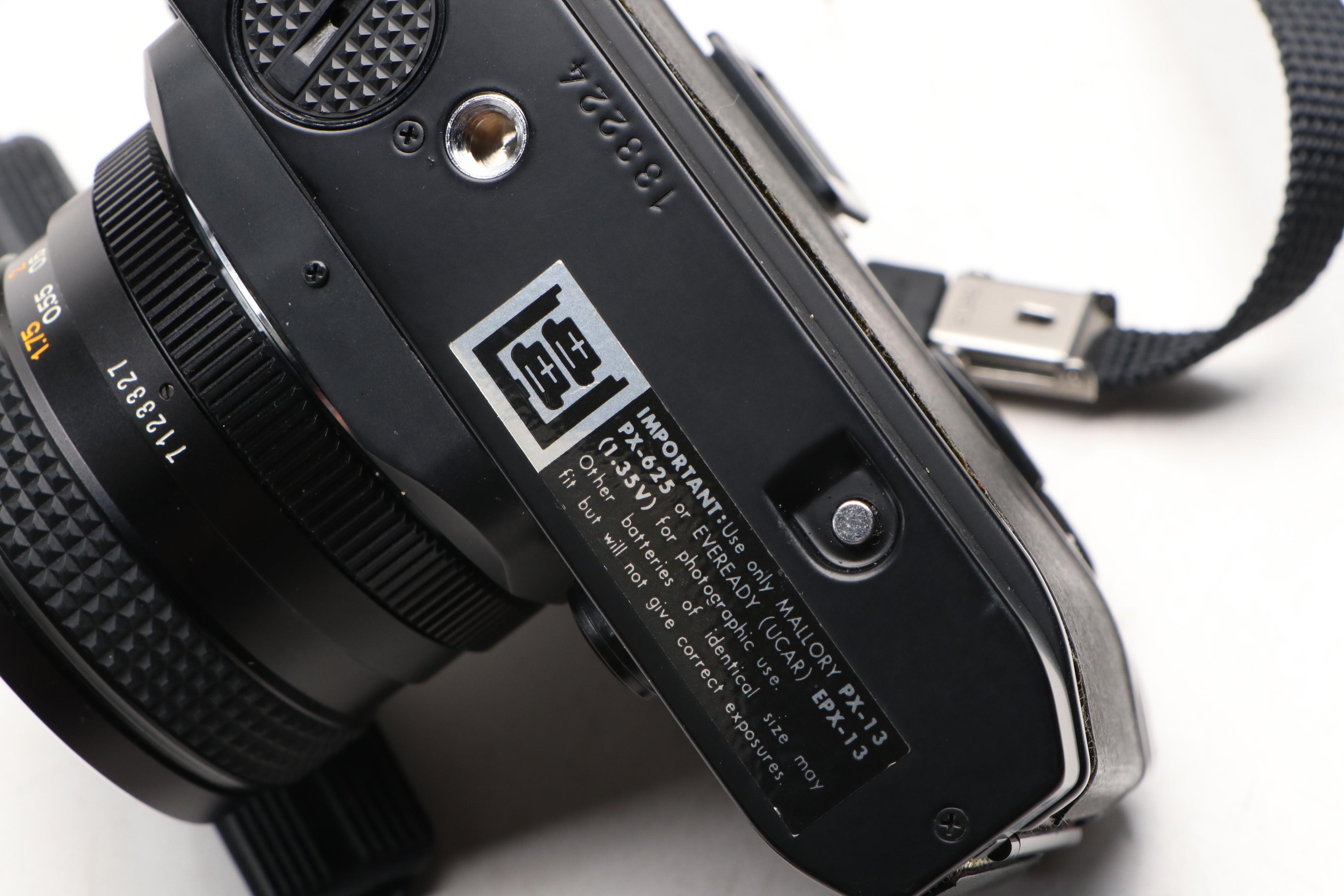 Konica Autoreflex TC SLR with Polaroid Super Clincher and Kodak TLR, 20th C.