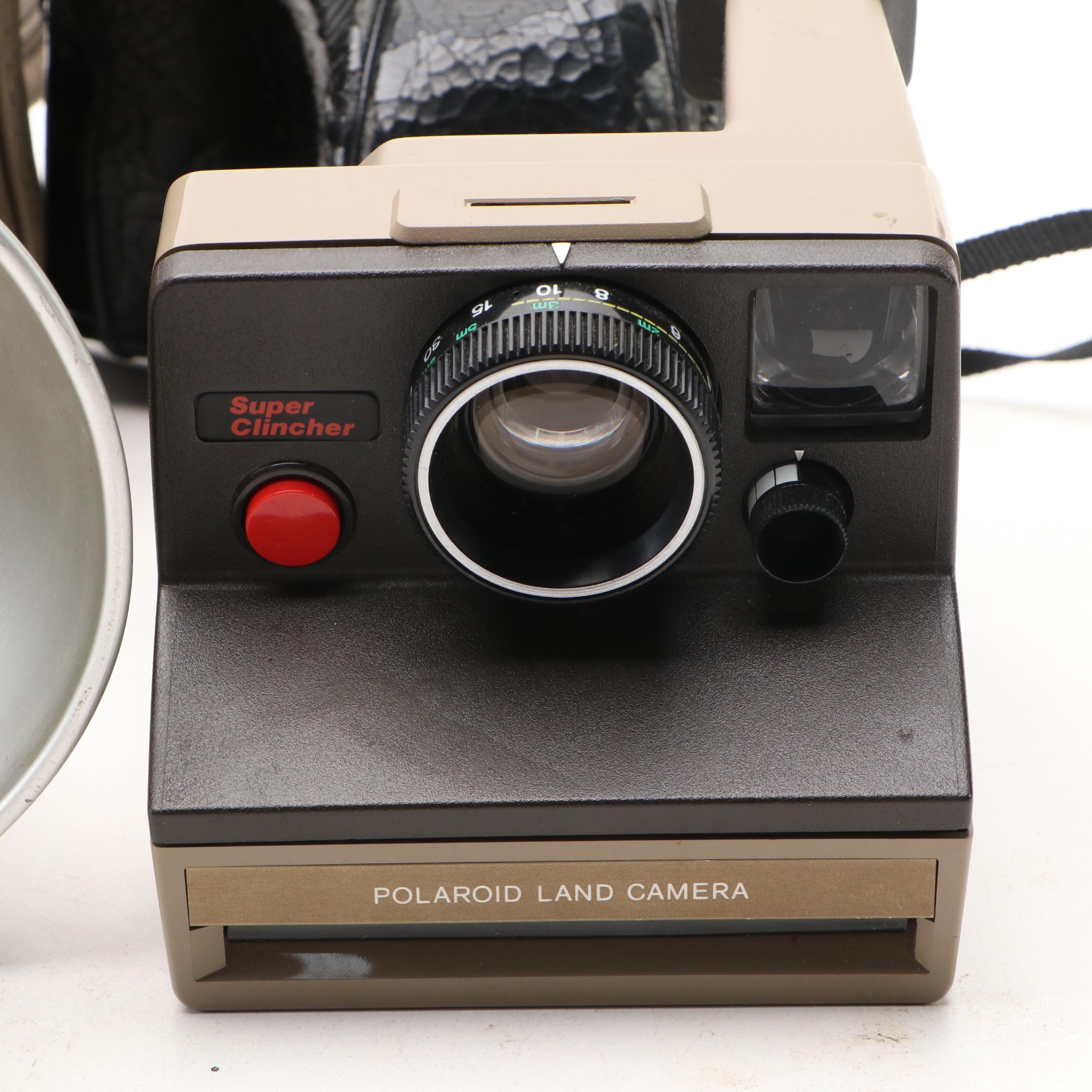 Konica Autoreflex TC SLR with Polaroid Super Clincher and Kodak TLR, 20th C.