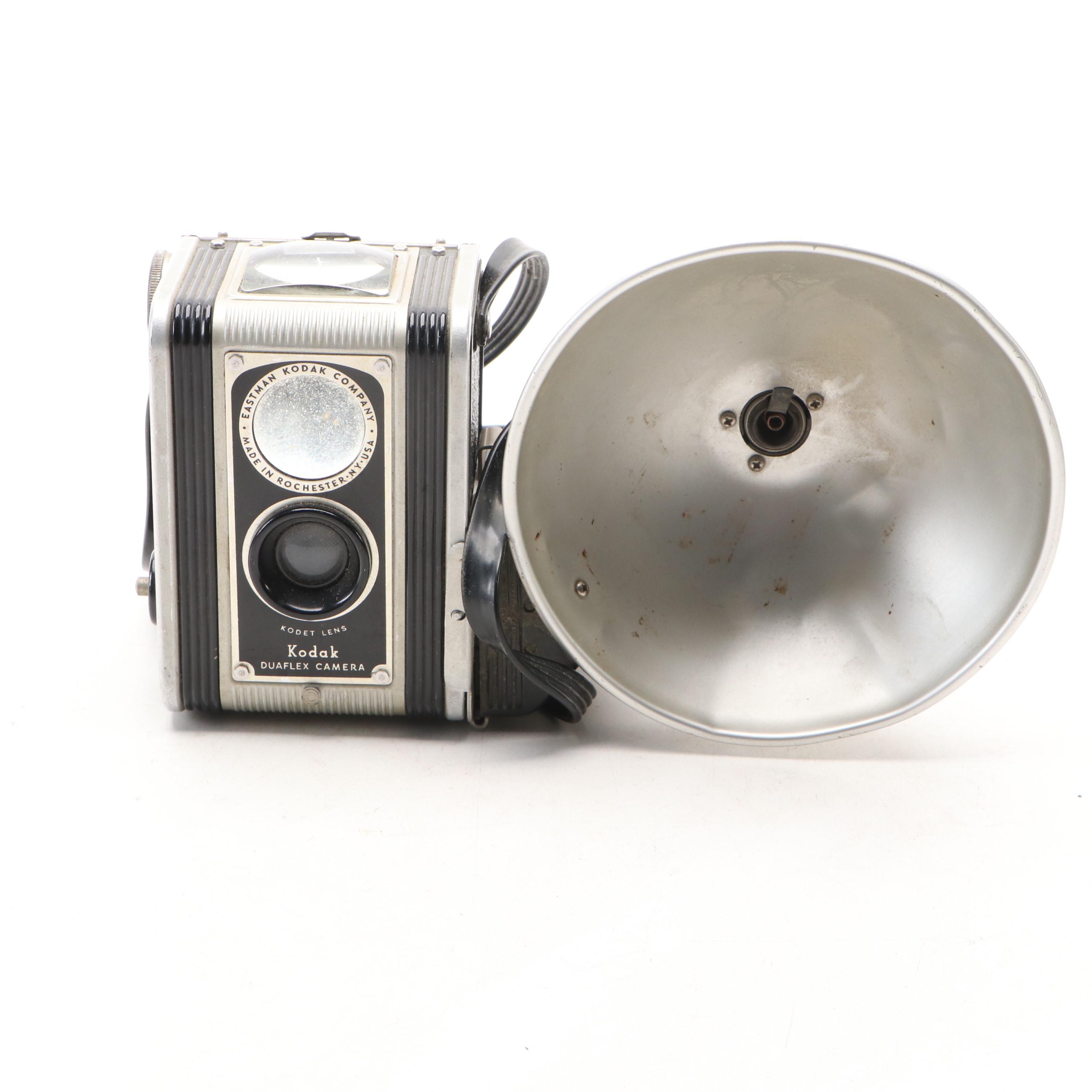 Konica Autoreflex TC SLR with Polaroid Super Clincher and Kodak TLR, 20th C.