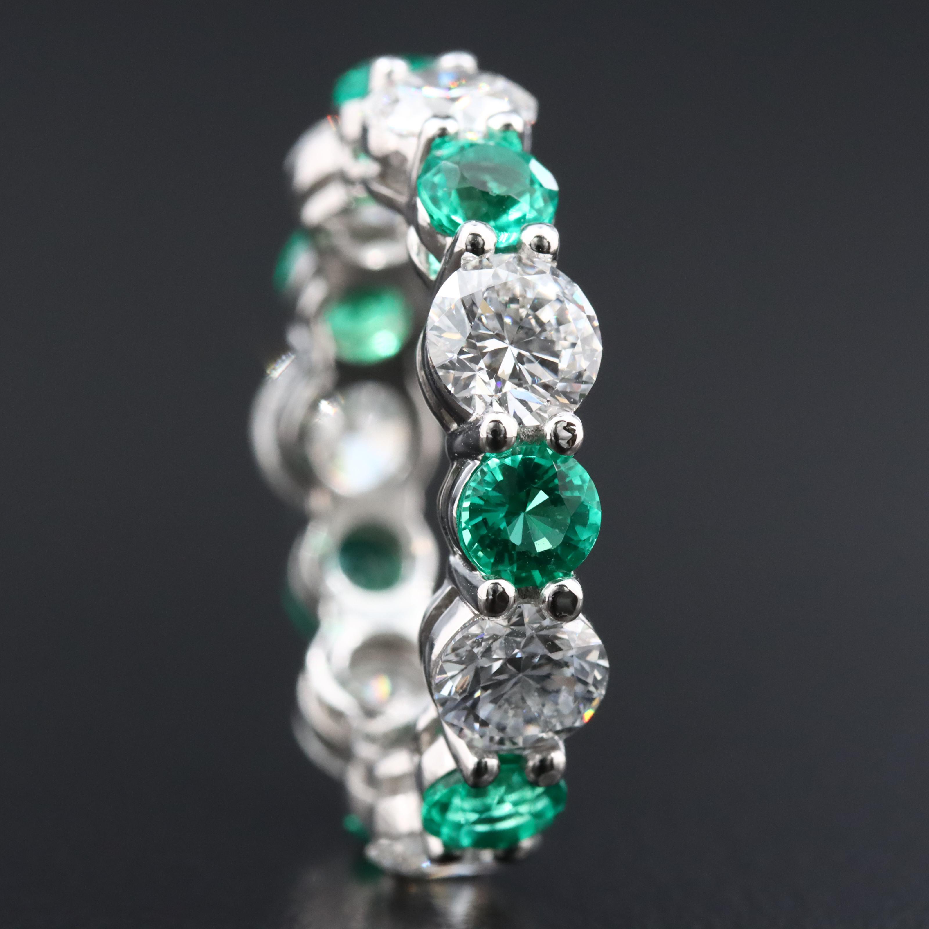 14K 4.03 CTW Lab Grown Diamond and 1.94 CTW Emerald Eternity Band