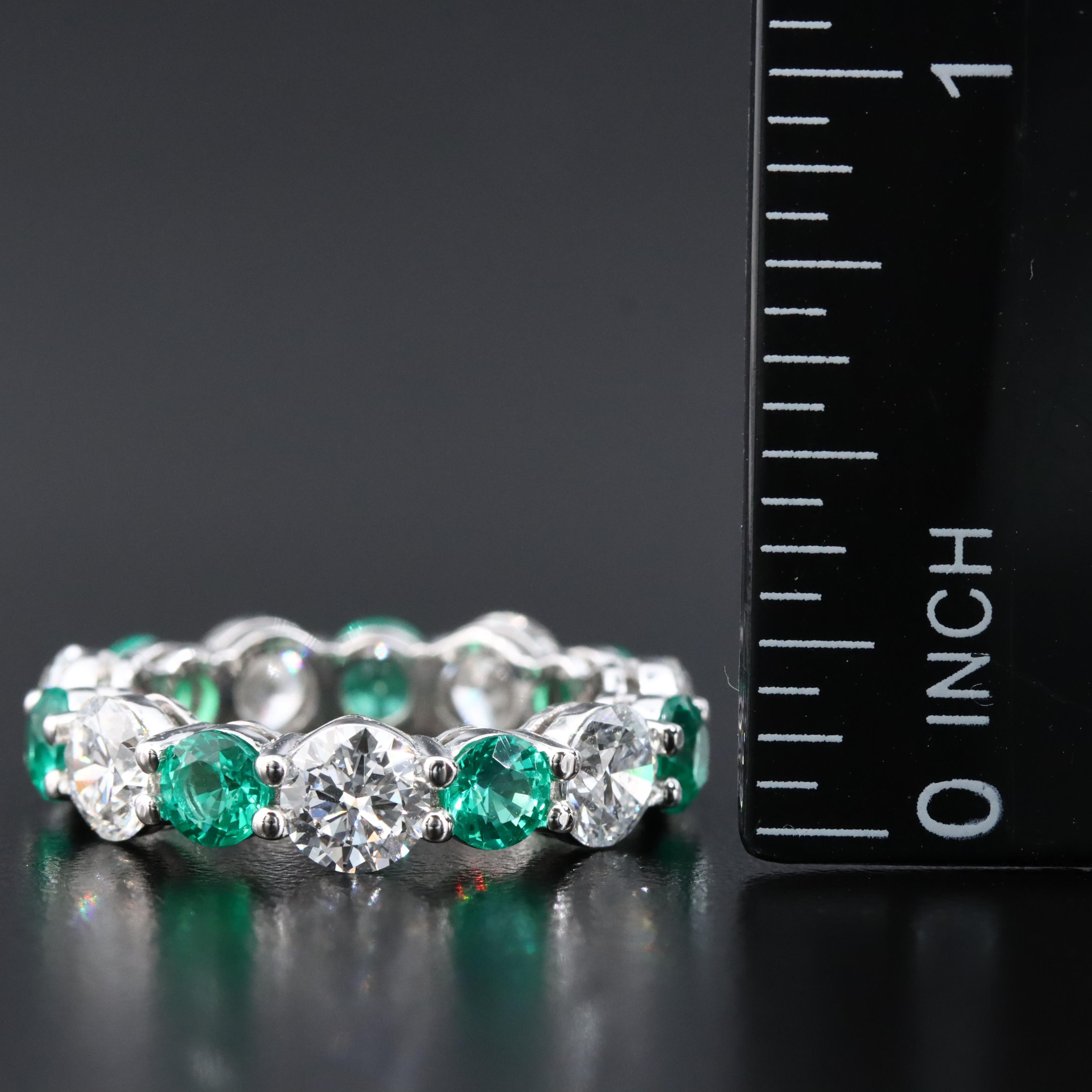 14K 4.03 CTW Lab Grown Diamond and 1.94 CTW Emerald Eternity Band