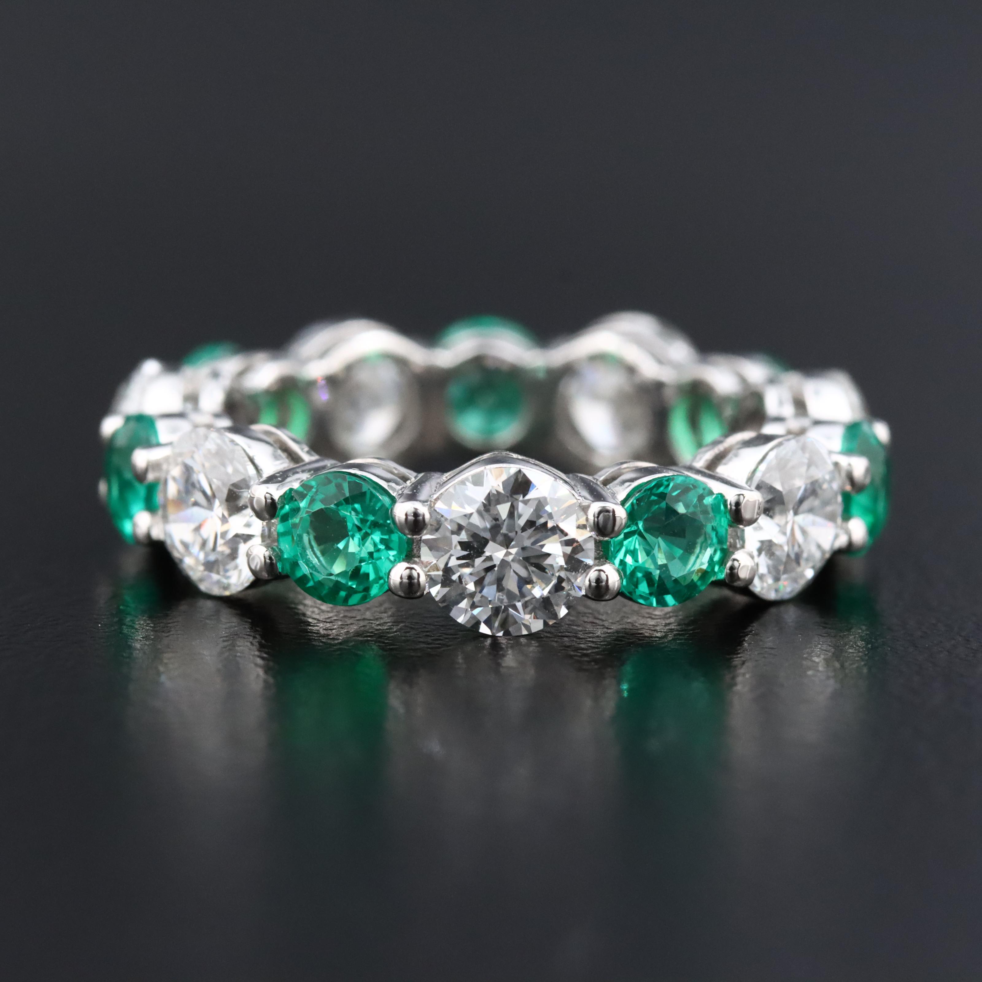 14K 4.03 CTW Lab Grown Diamond and 1.94 CTW Emerald Eternity Band
