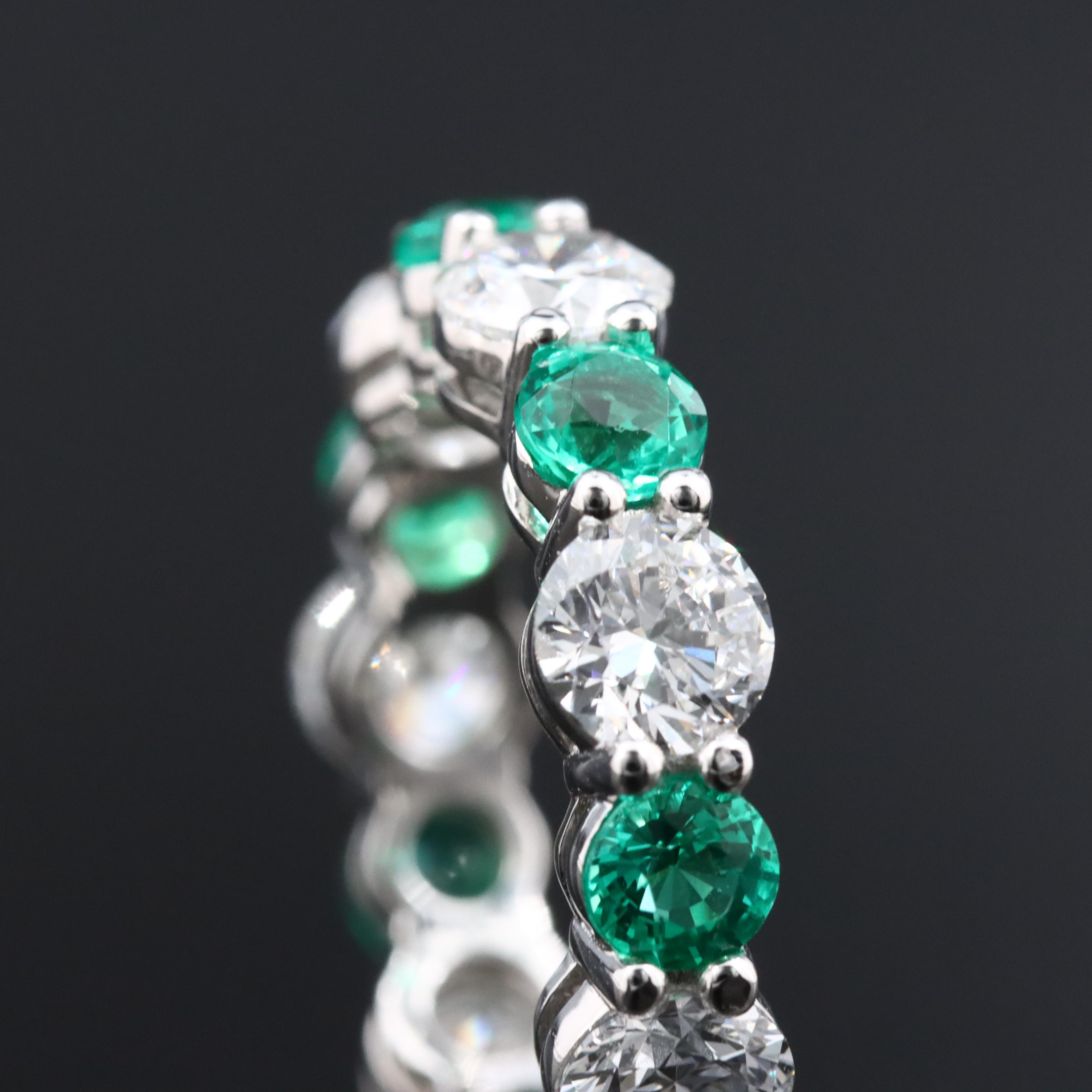 14K 4.03 CTW Lab Grown Diamond and 1.94 CTW Emerald Eternity Band