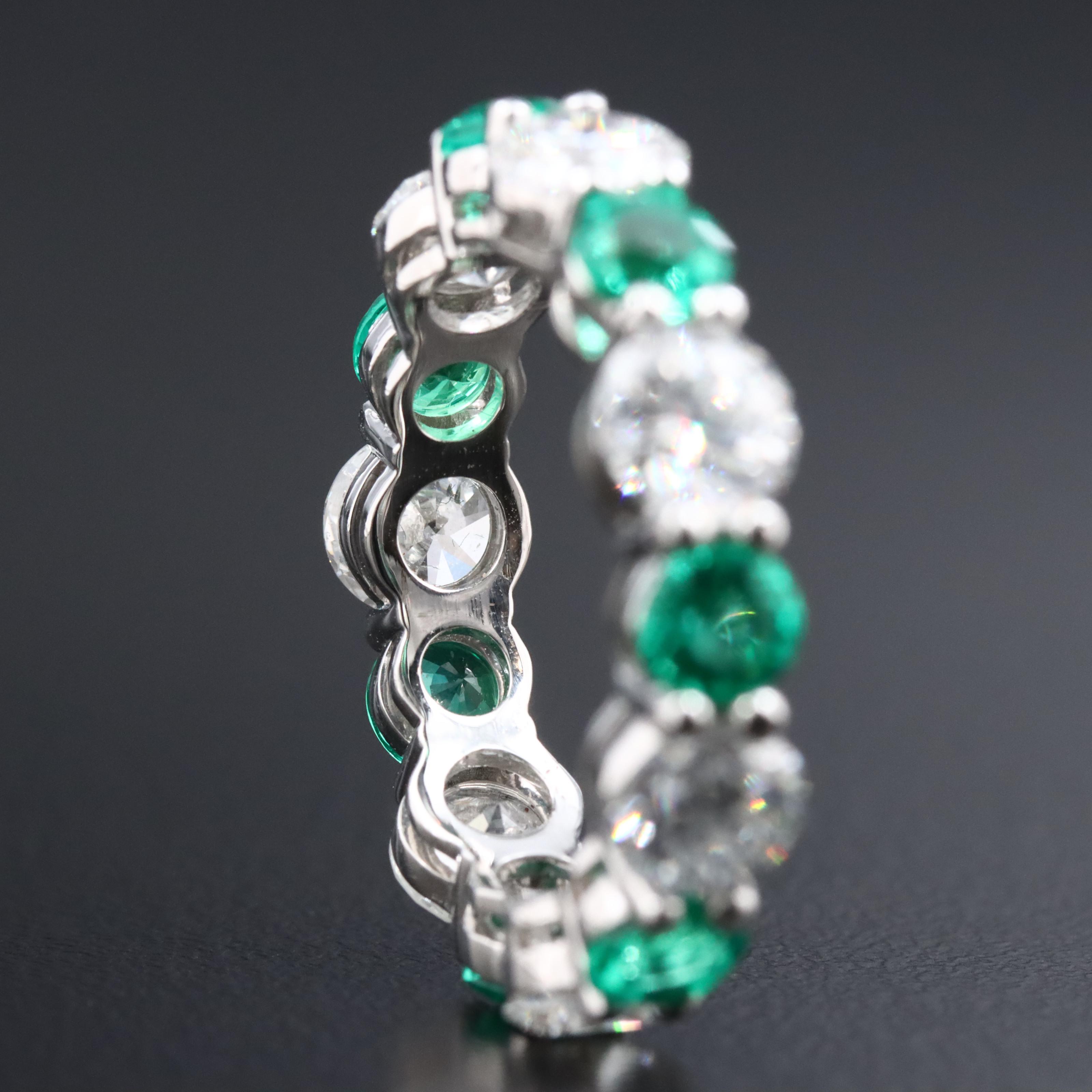 14K 4.03 CTW Lab Grown Diamond and 1.94 CTW Emerald Eternity Band