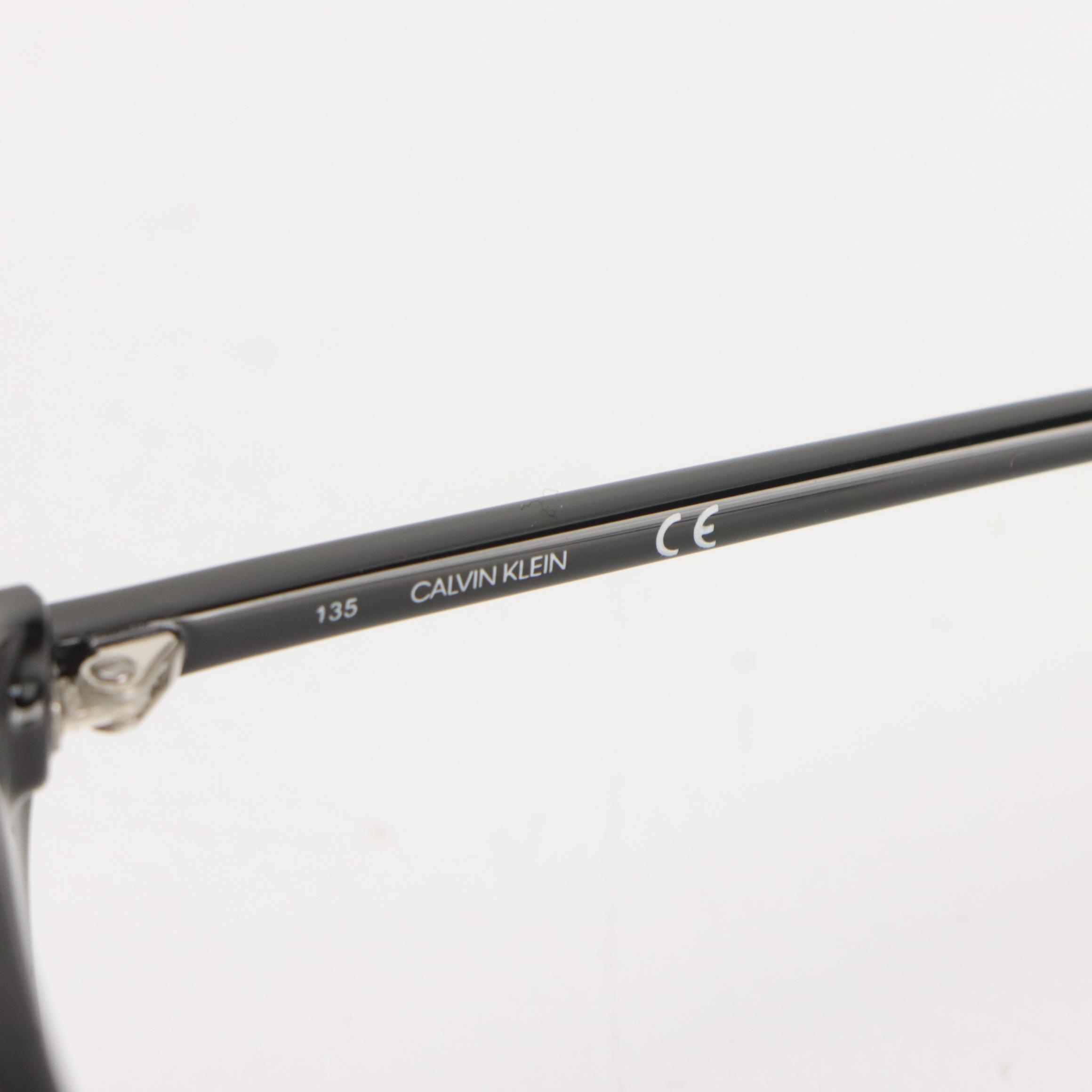 Calvin Klein CK18536S 001 Black Cat Eye Sunglasses in Case