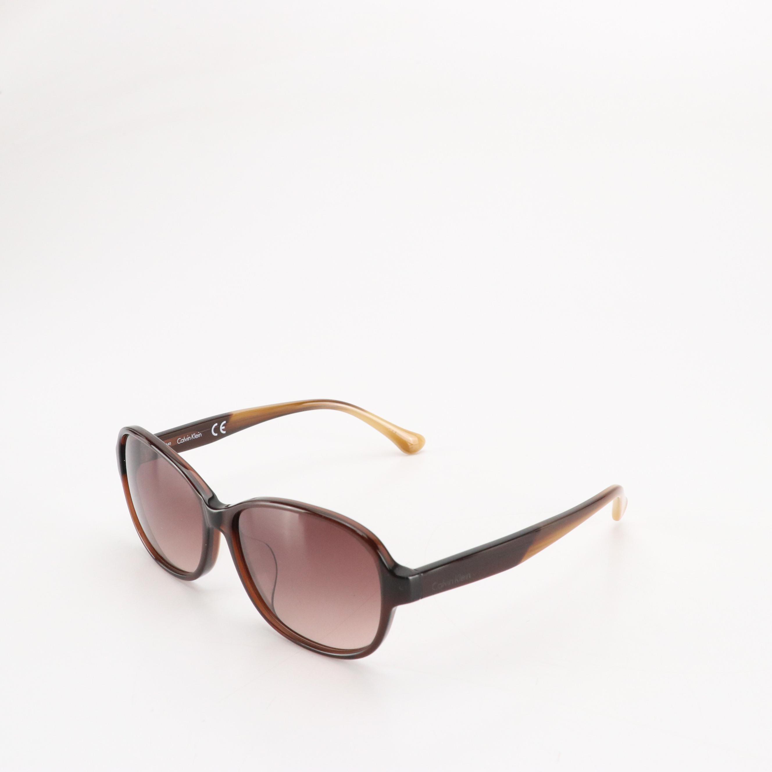 Calvin Klein CK4334SA 210 Brown Oval Sunglasses in Case