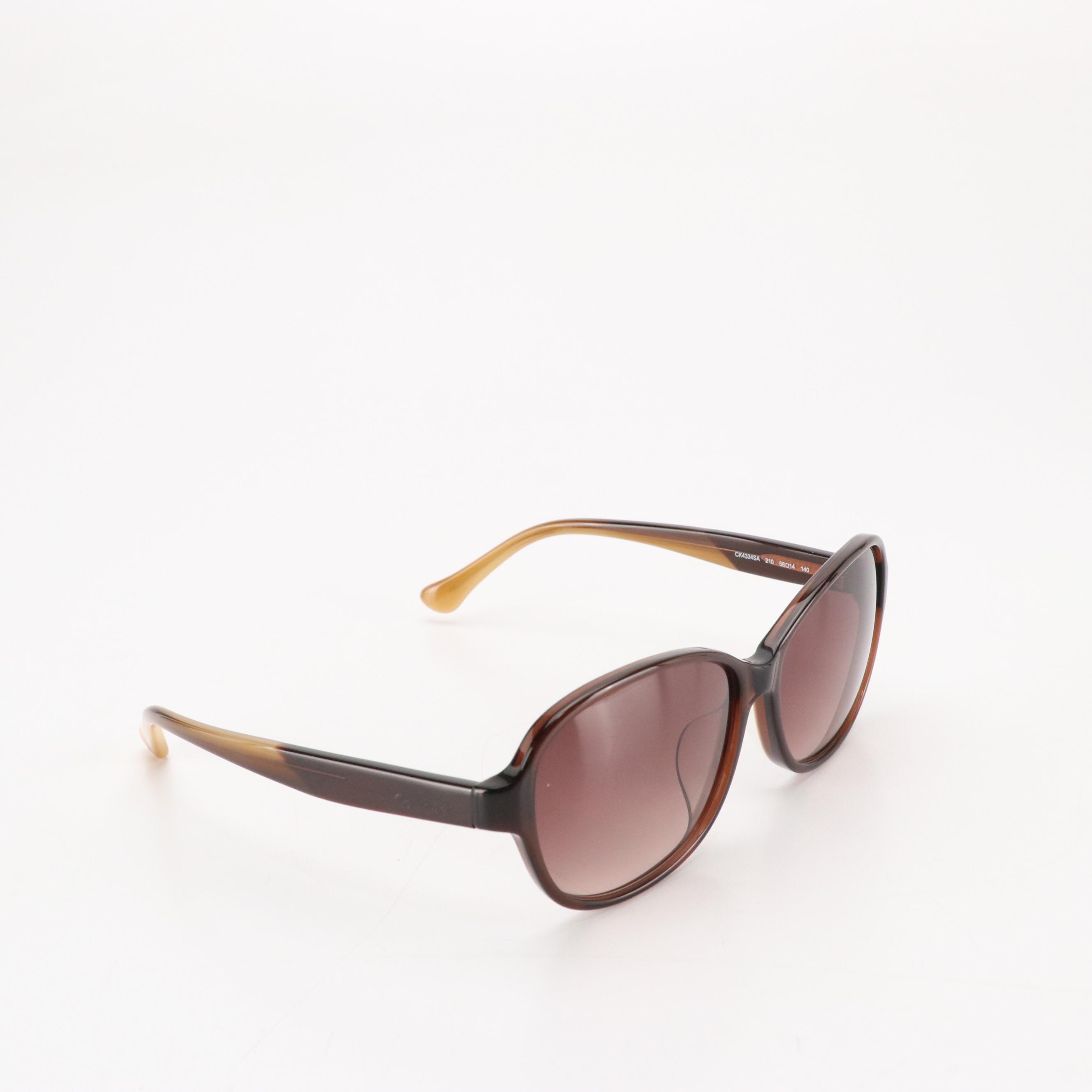 Calvin Klein CK4334SA 210 Brown Oval Sunglasses in Case