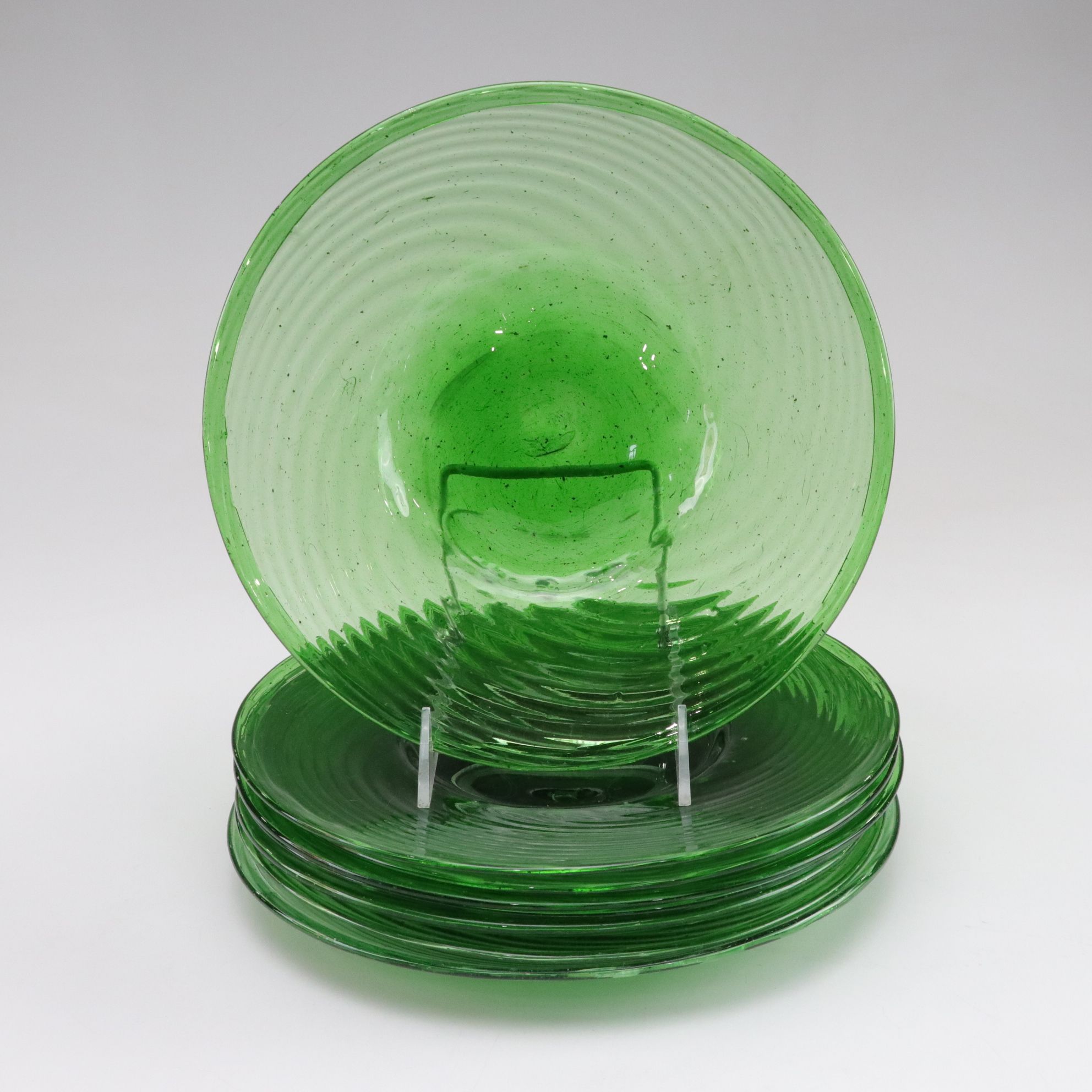 Sixteen Hand Blown Glass Swirl Plates