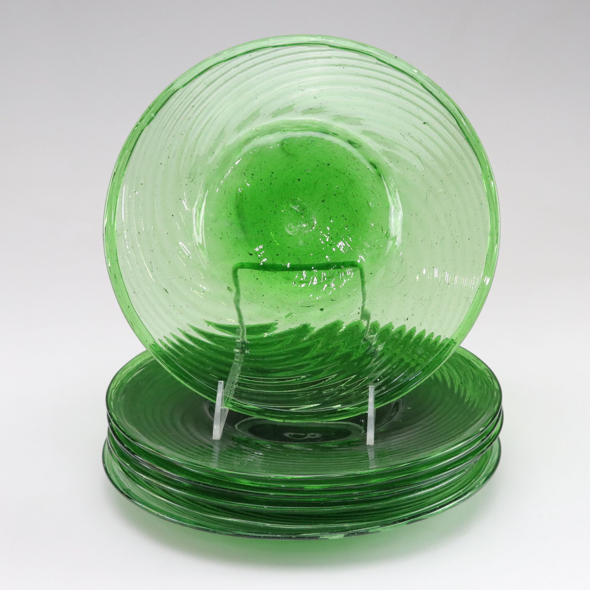 Sixteen Hand Blown Glass Swirl Plates