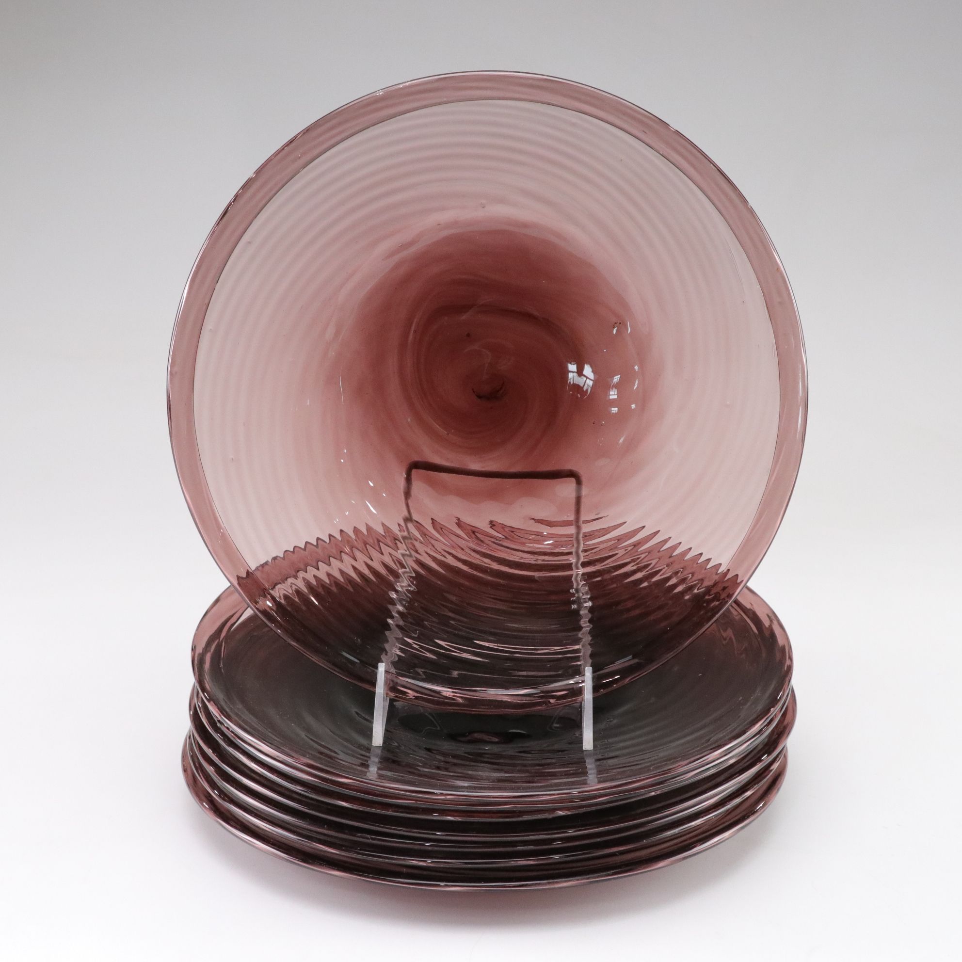 Sixteen Hand Blown Glass Swirl Plates