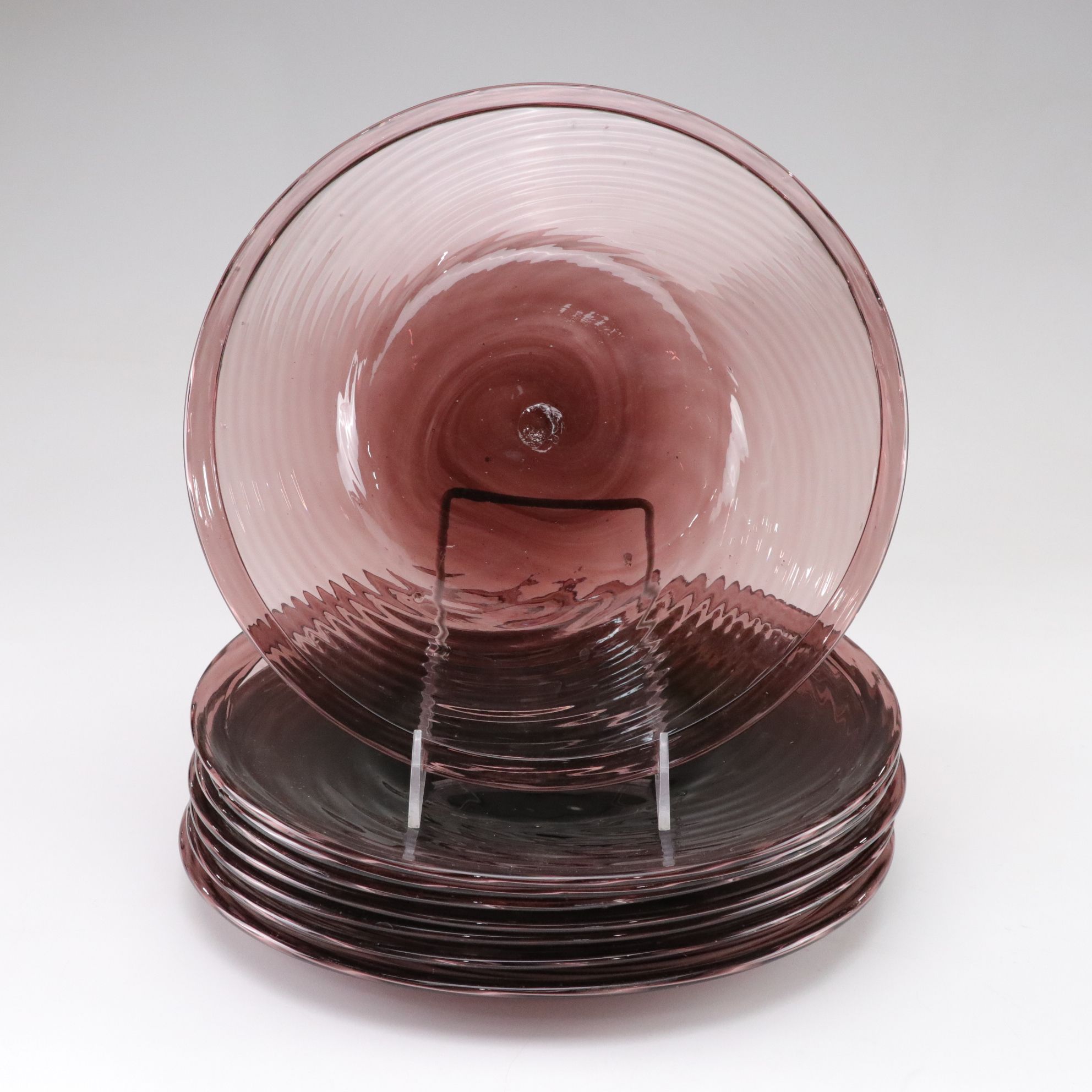Sixteen Hand Blown Glass Swirl Plates