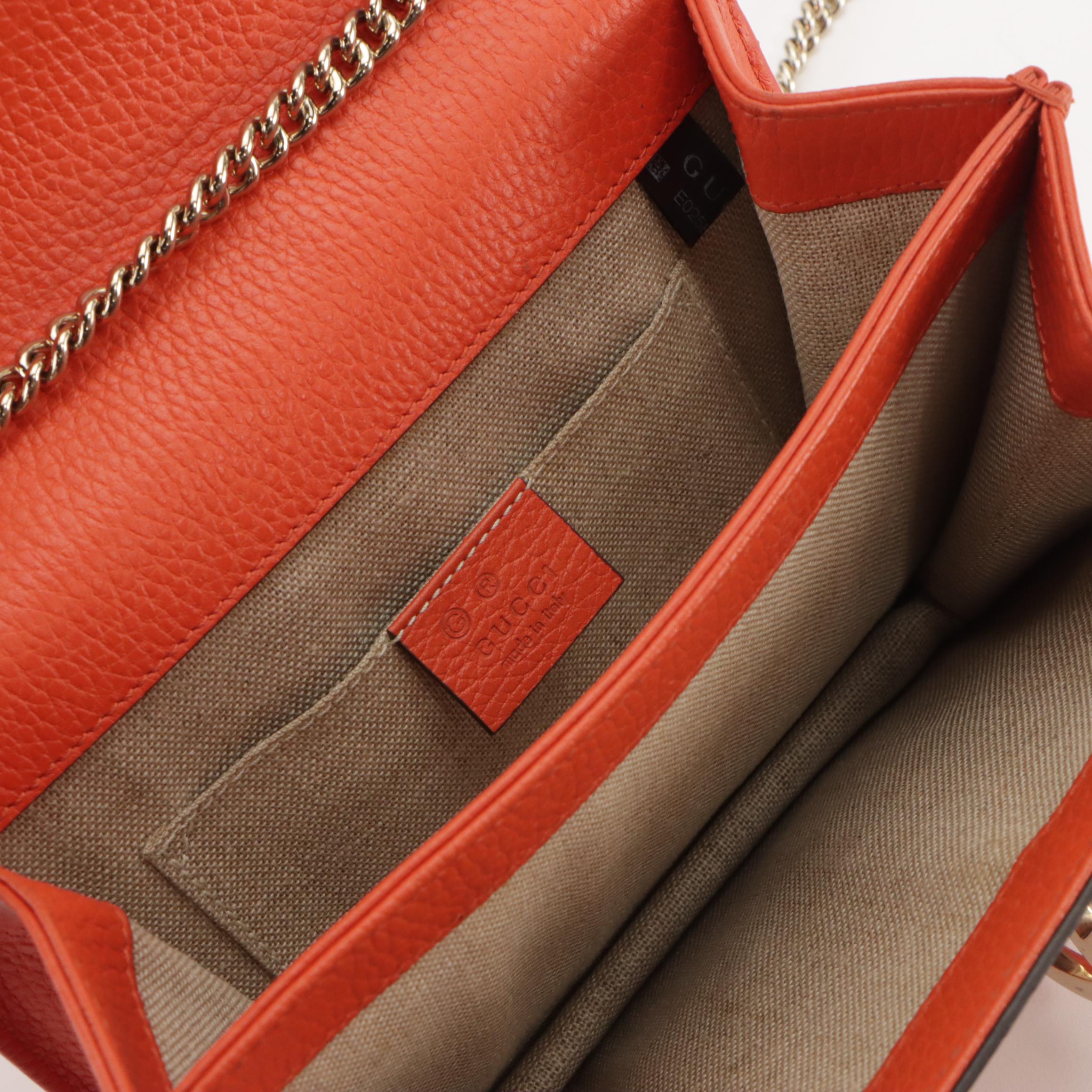 Gucci Interlocking GG Dollar Chain Strap Bag in Orange Grained Leather