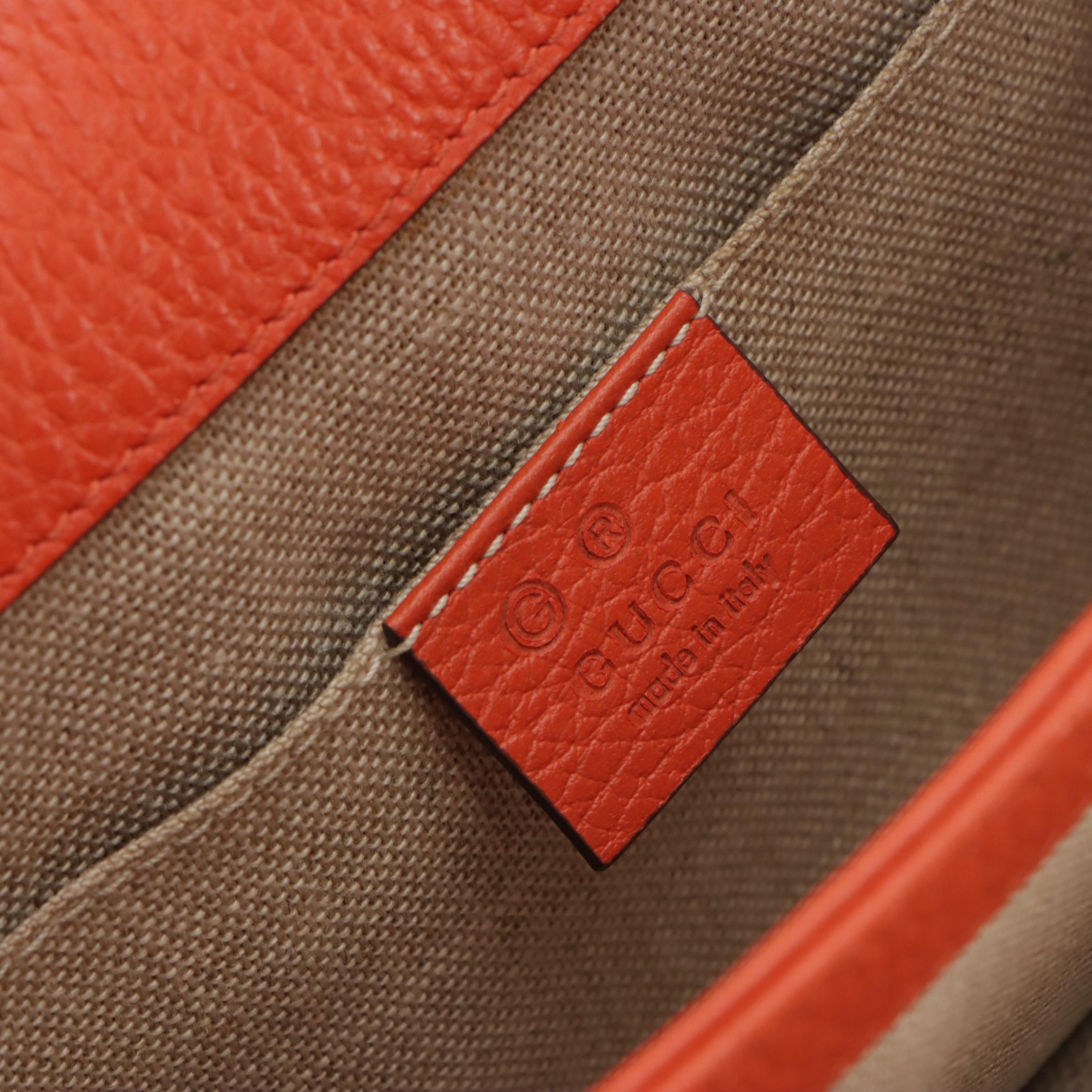 Gucci Interlocking GG Dollar Chain Strap Bag in Orange Grained Leather