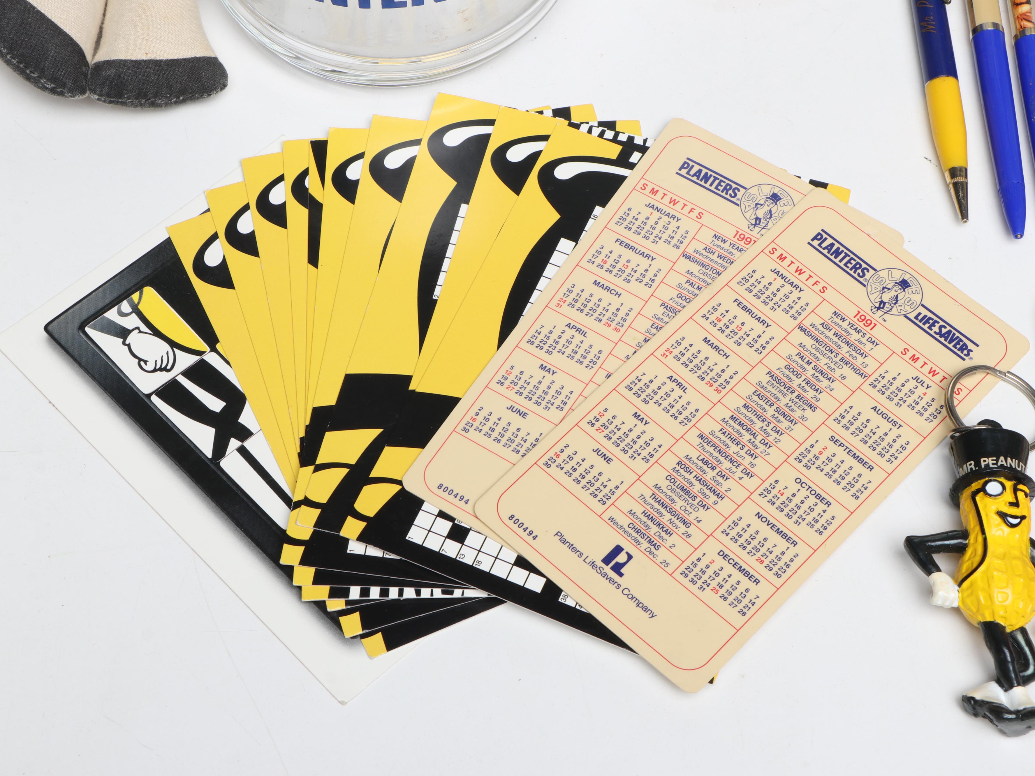 Mr. Peanut Glass Highballs and Lidded Jar with Other Mr. Peanut Memorabilia