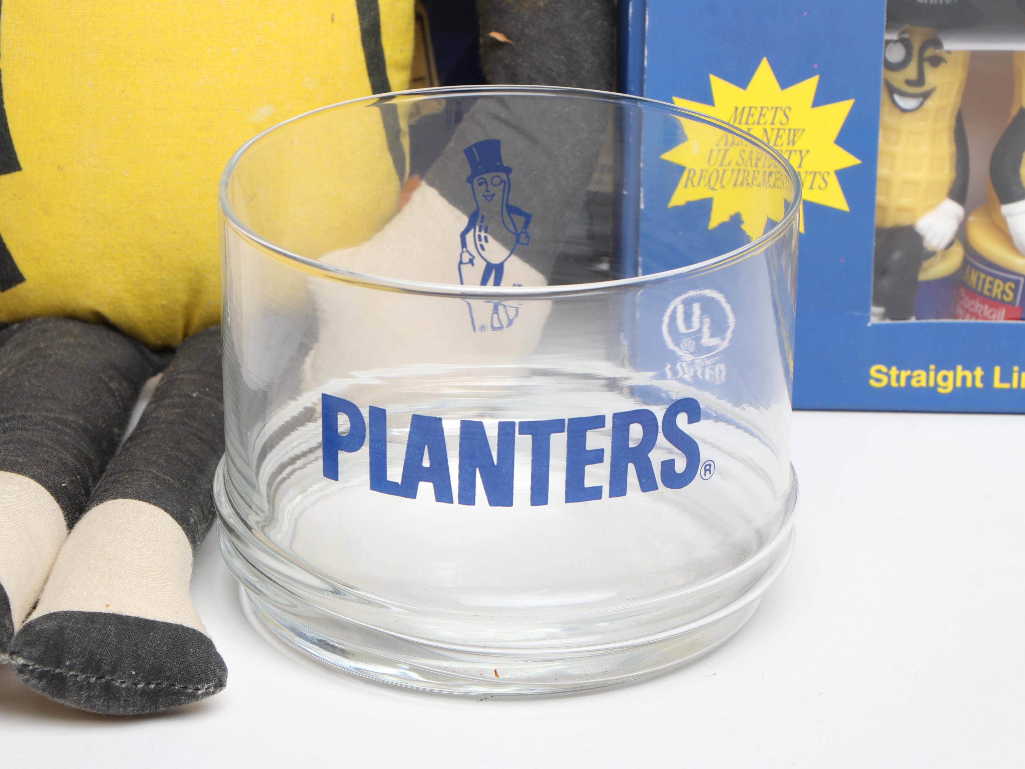 Mr. Peanut Glass Highballs and Lidded Jar with Other Mr. Peanut Memorabilia