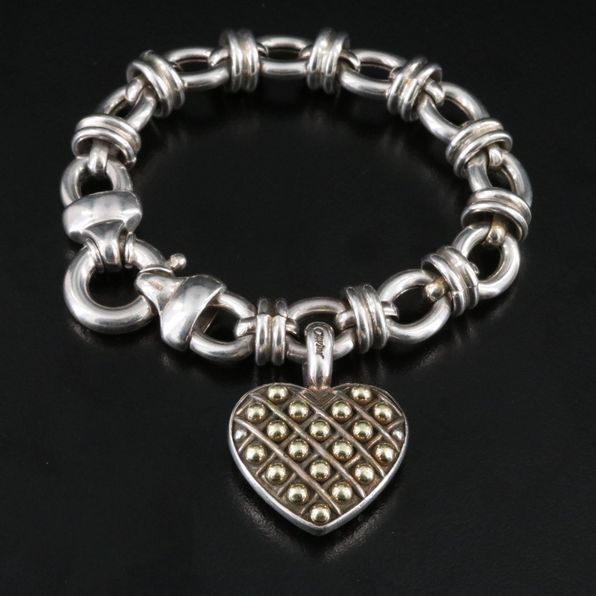 Caviar Sterling and 18K Heart Pendant on an Oval Link Charm Bracelet