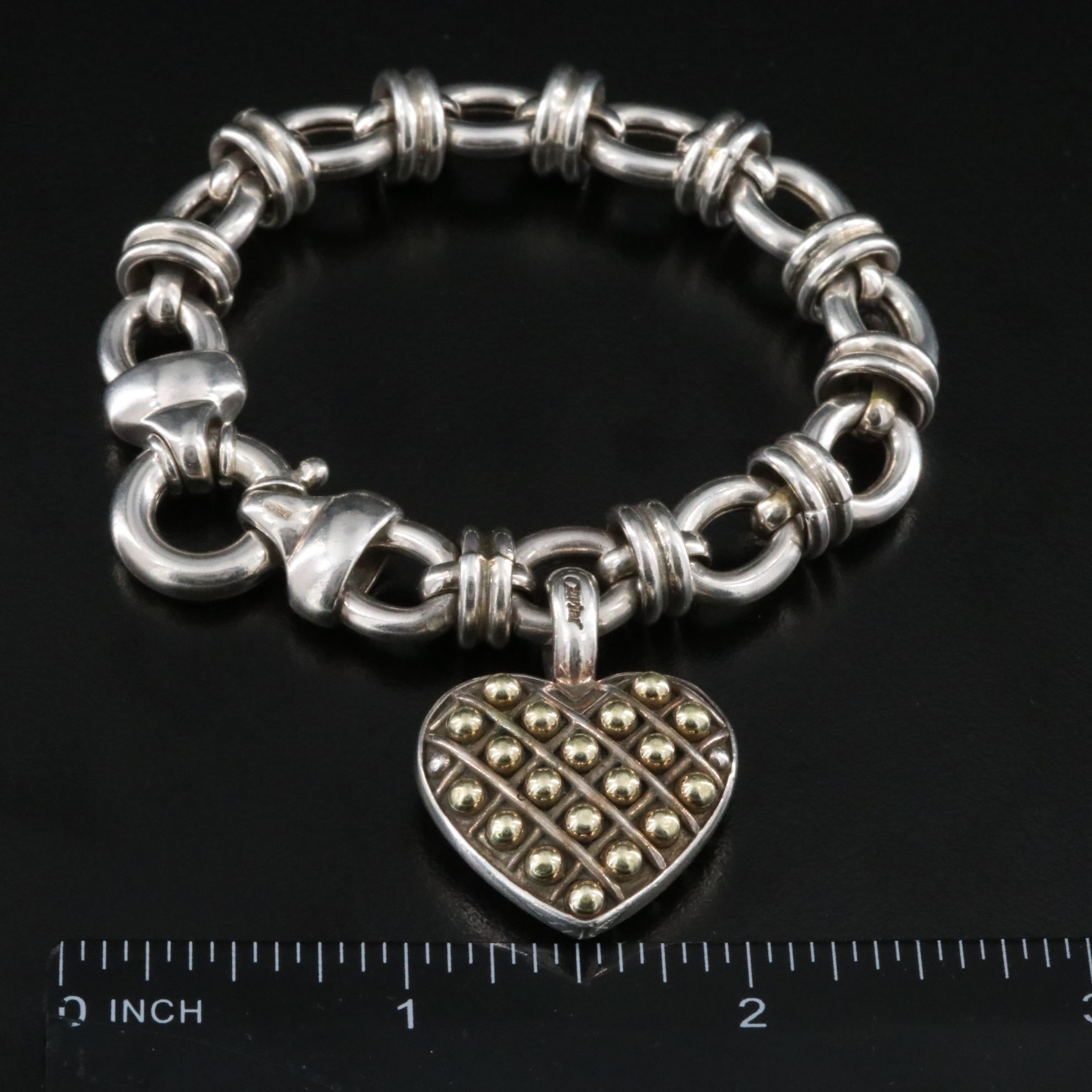 Caviar Sterling and 18K Heart Pendant on an Oval Link Charm Bracelet