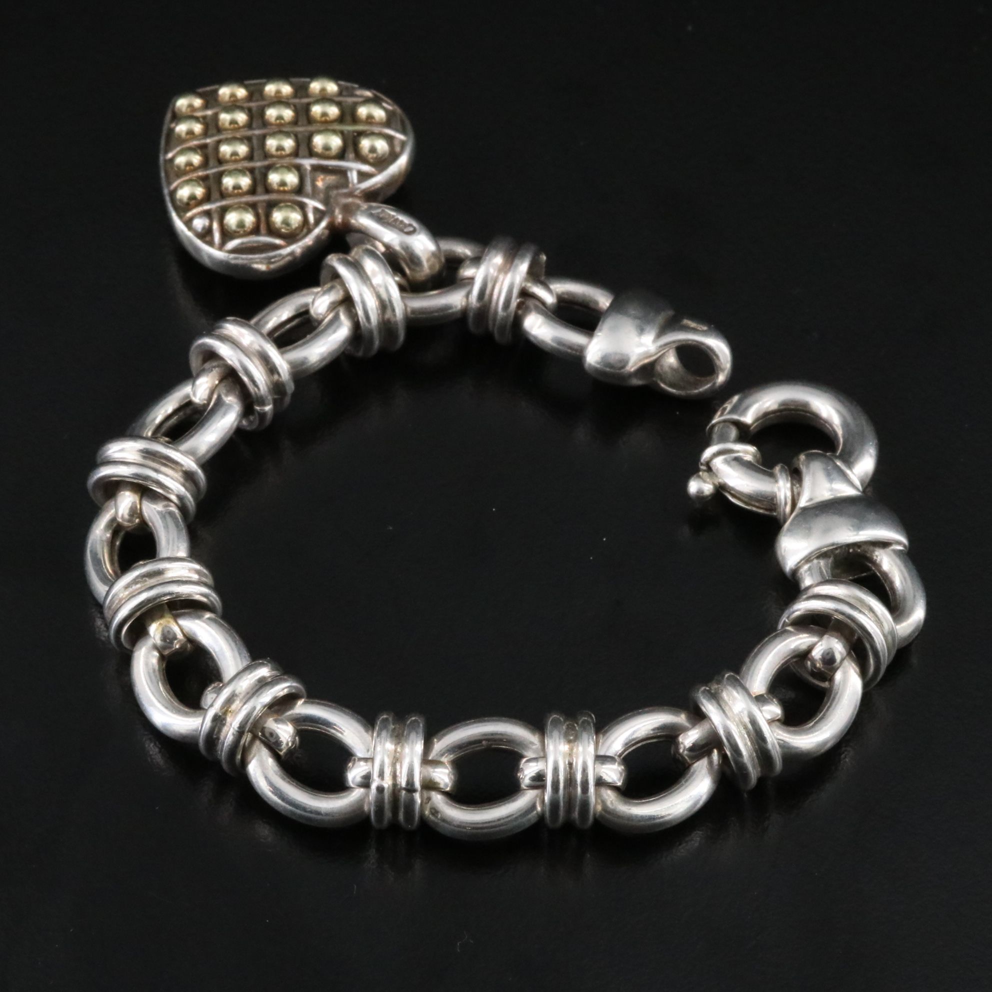 Caviar Sterling and 18K Heart Pendant on an Oval Link Charm Bracelet