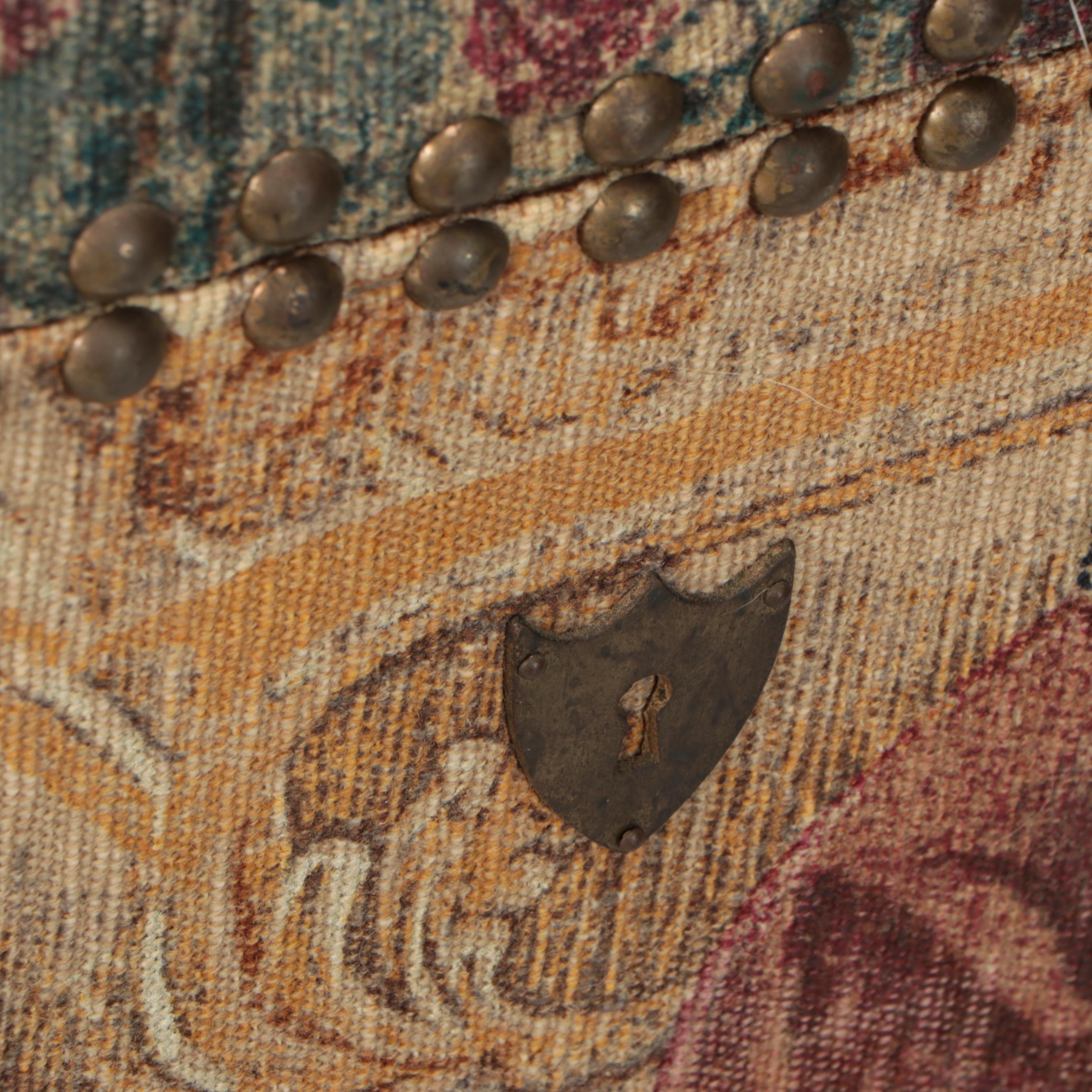 Brass-Tacked Tapestry Upholstered and Mirror Base Bombe Chest