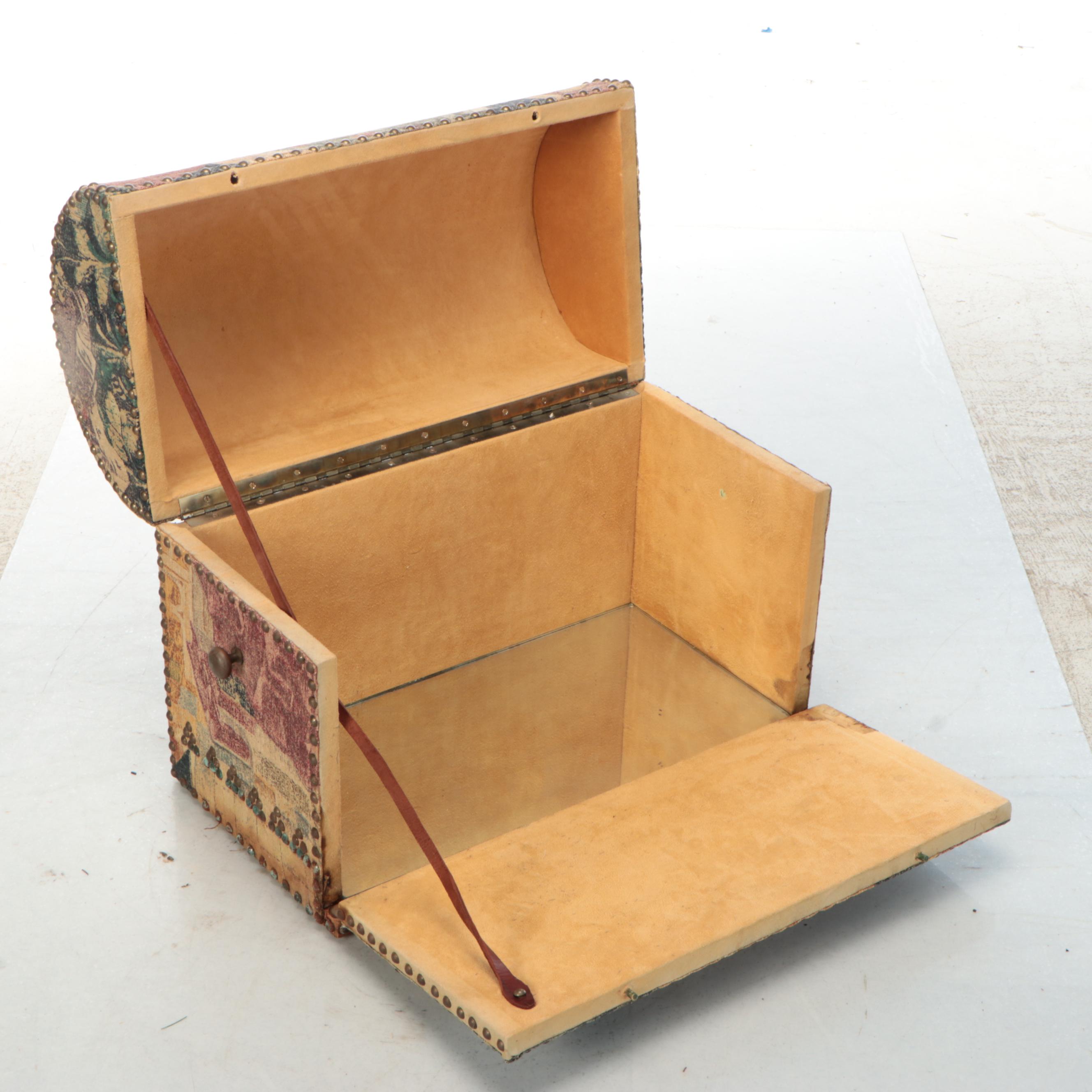 Brass-Tacked Tapestry Upholstered and Mirror Base Bombe Chest