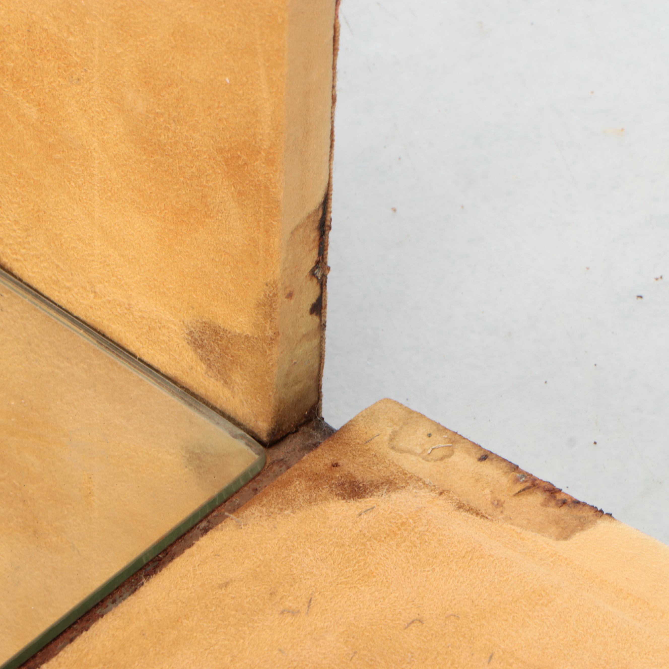 Brass-Tacked Tapestry Upholstered and Mirror Base Bombe Chest