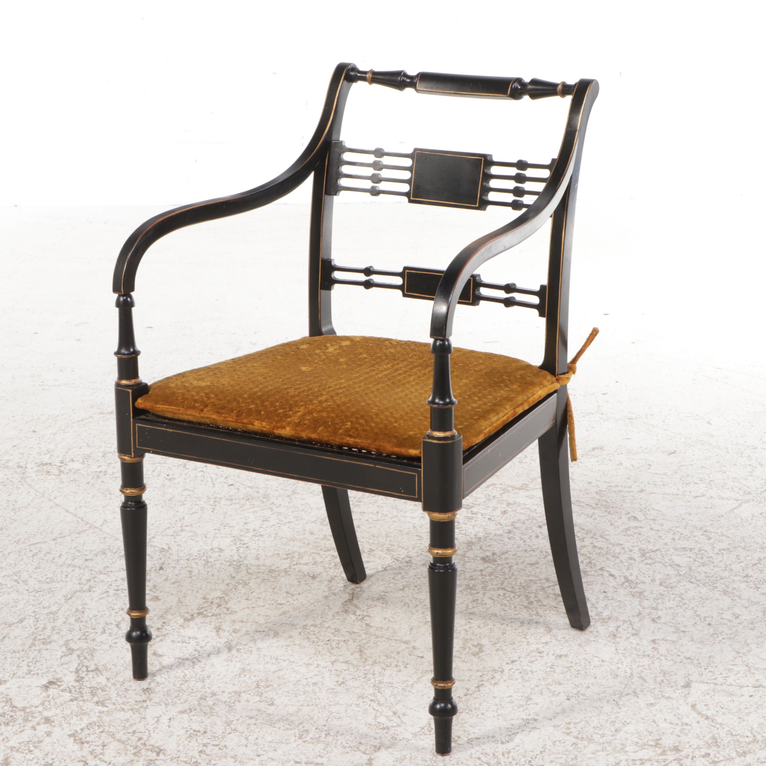 English Regency Style Gilt Accented Ebonized Wood Arm Chairs with Cane Seats