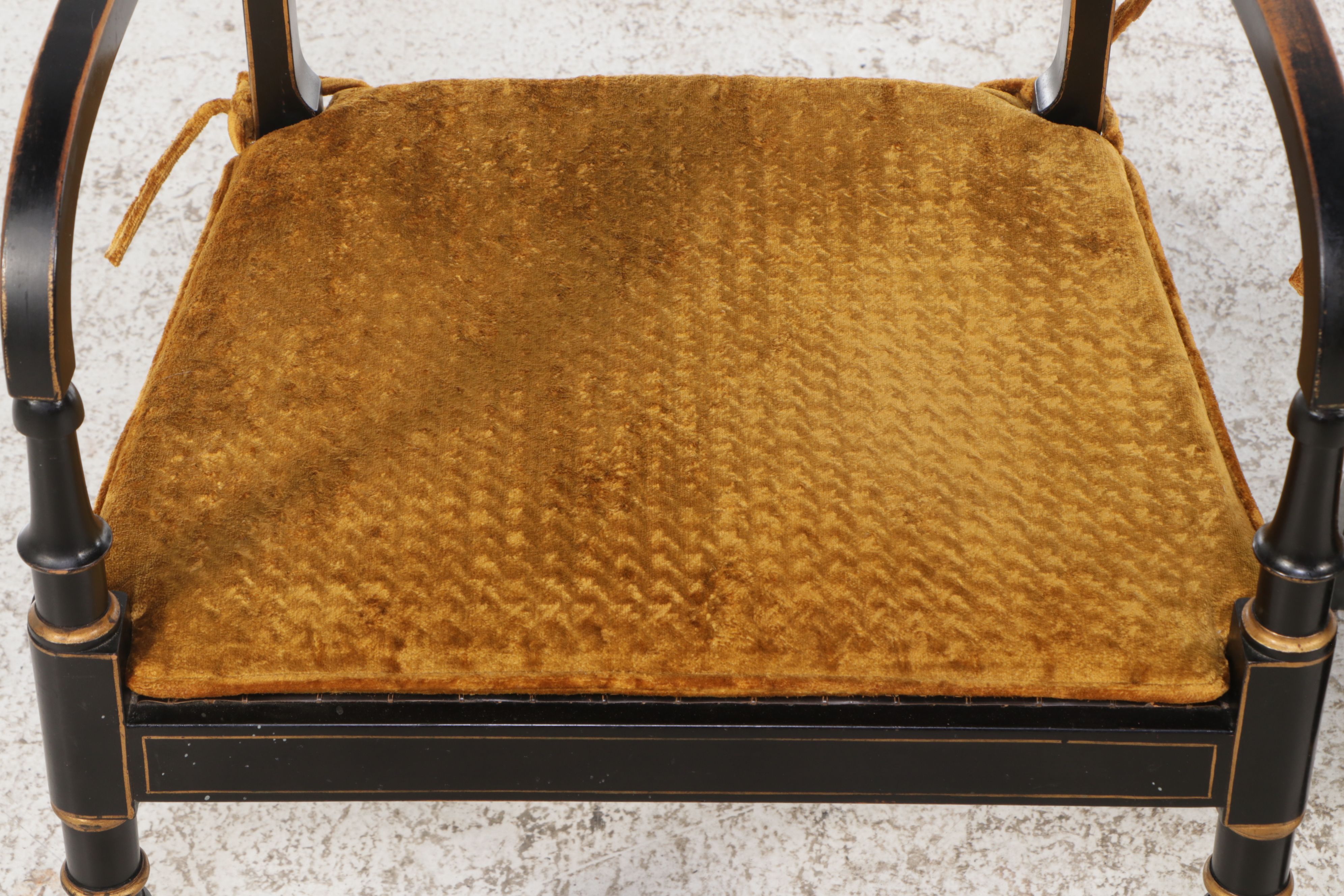 English Regency Style Gilt Accented Ebonized Wood Arm Chairs with Cane Seats