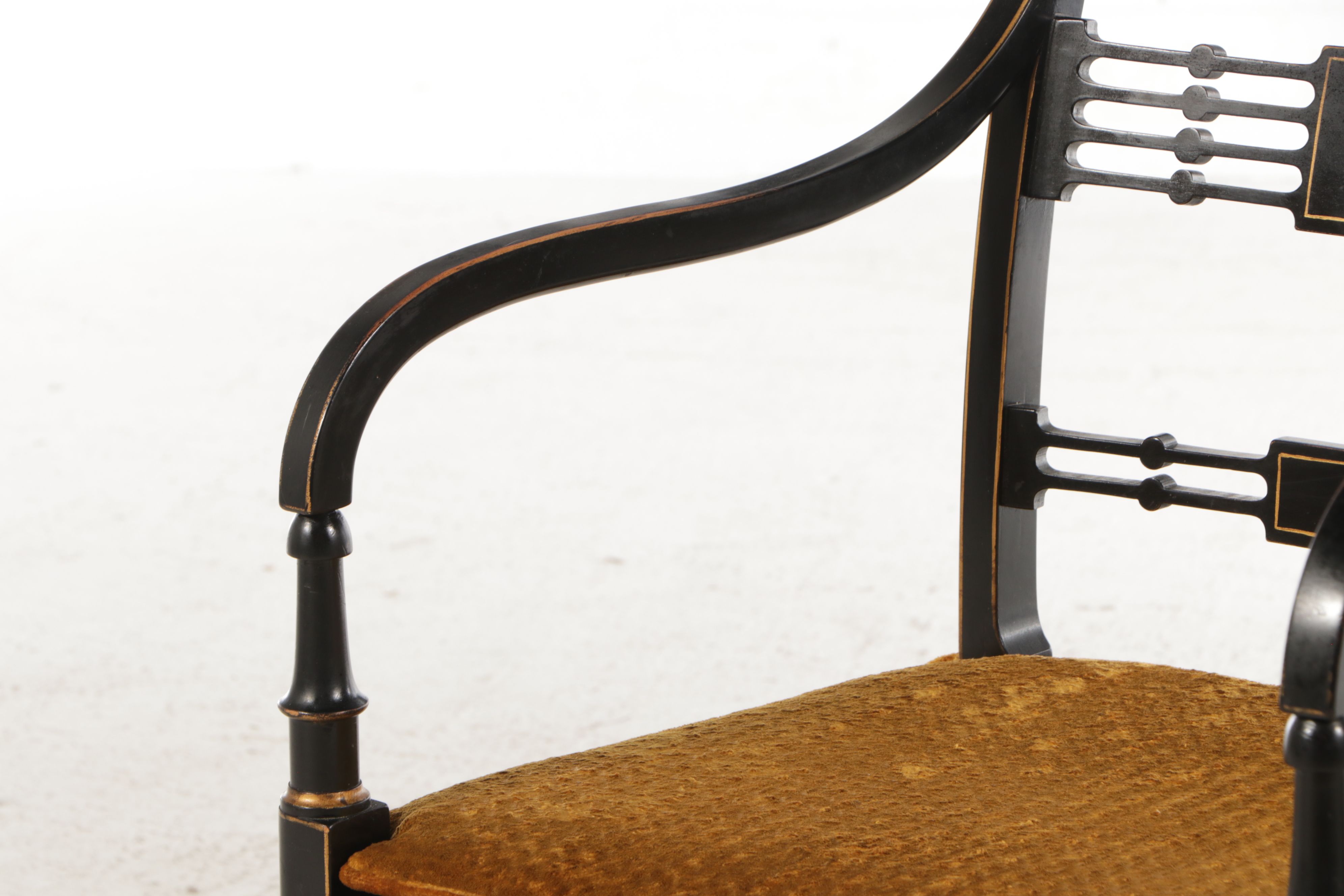 English Regency Style Gilt Accented Ebonized Wood Arm Chairs with Cane Seats