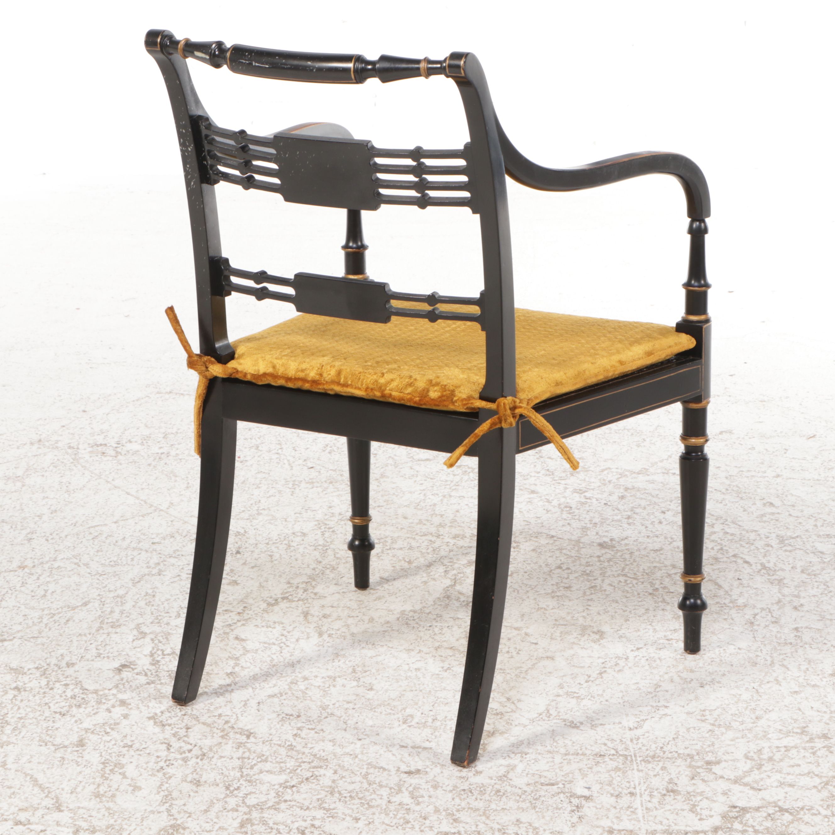 English Regency Style Gilt Accented Ebonized Wood Arm Chairs with Cane Seats