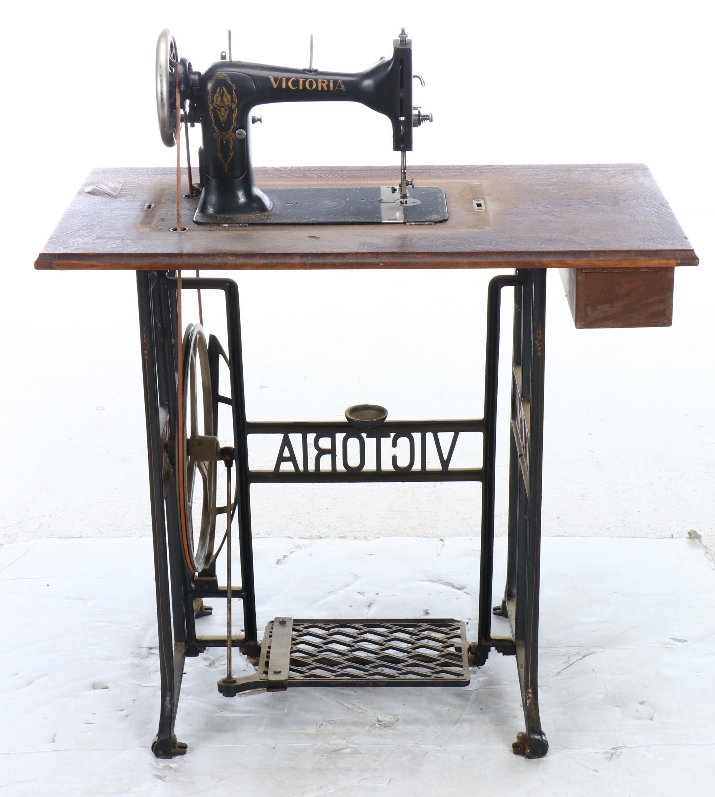 Victoria Sewing Machine with Mahogany Veneer Dome Treadle Table, circa 1906