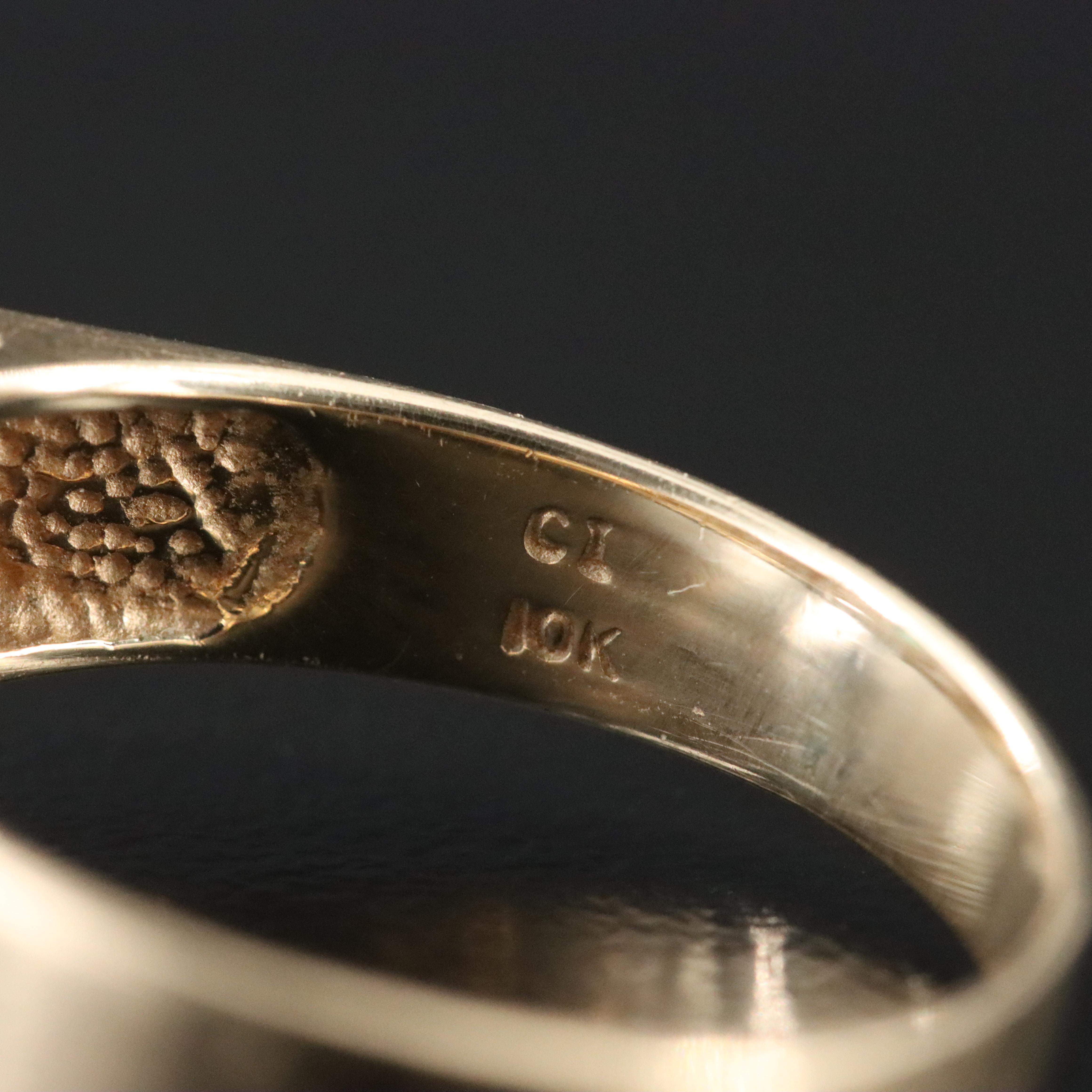 10K Emerald and Diamond Halo Ring