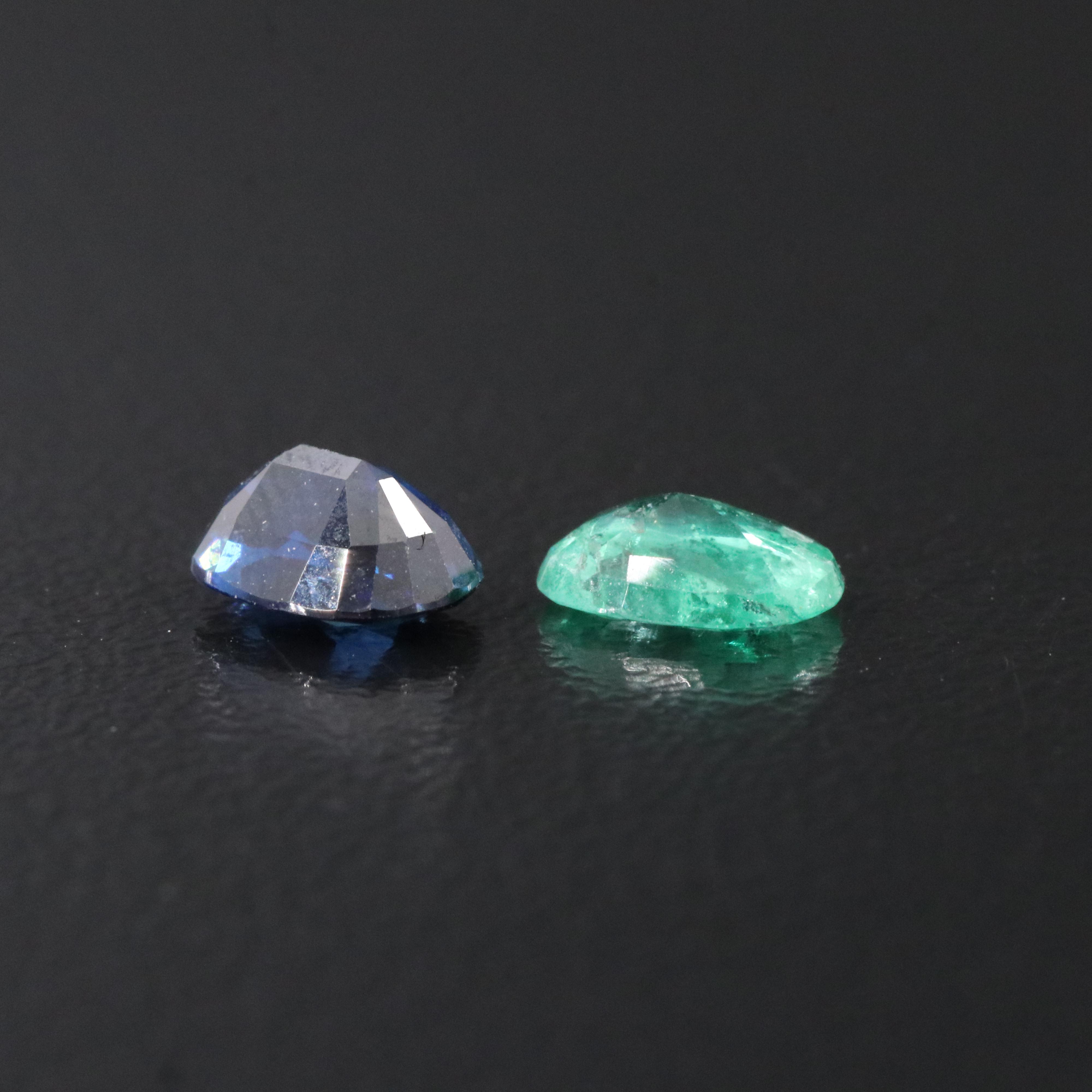 Loose 1.68 CTW Emerald and Sapphire Lot