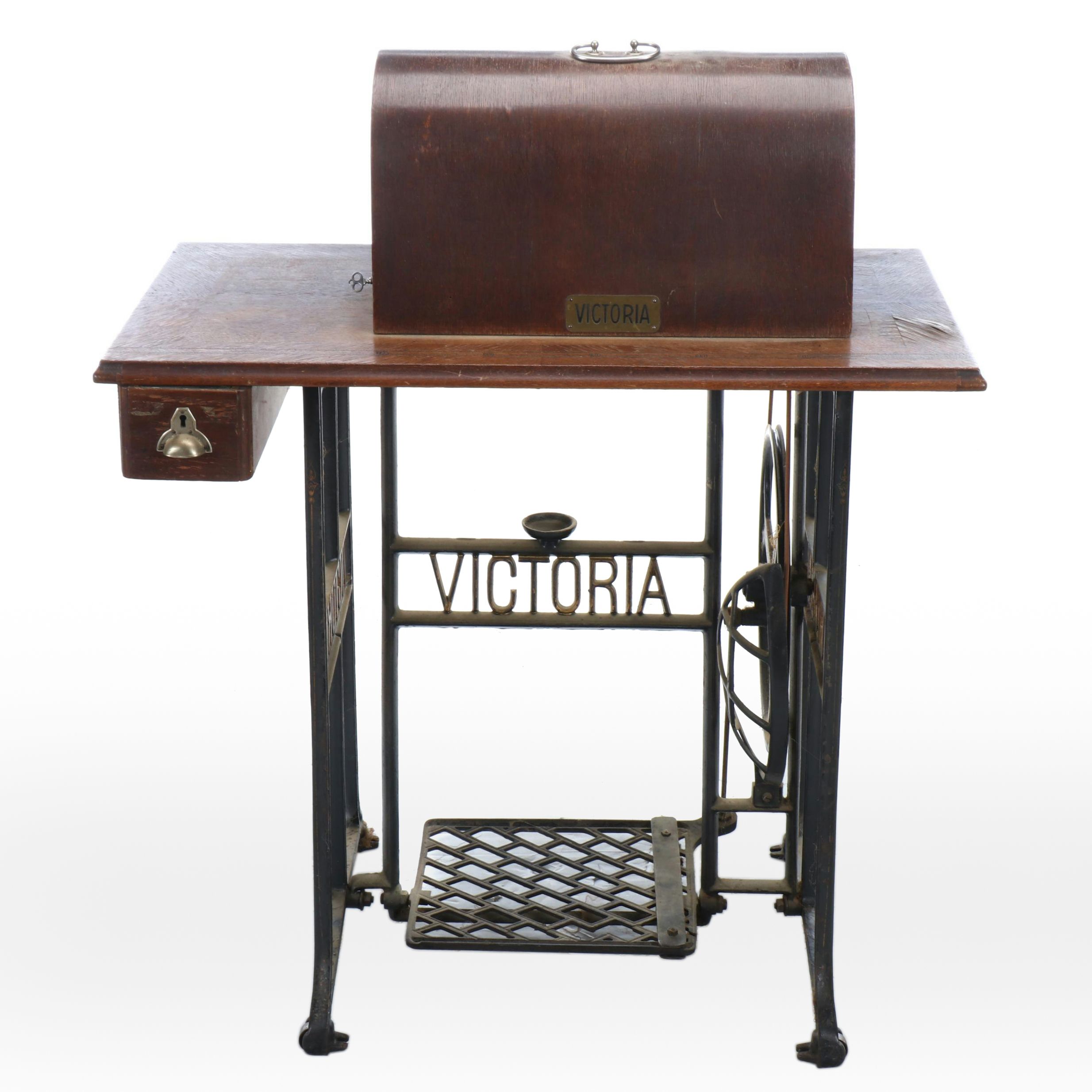 Victoria Sewing Machine with Mahogany Veneer Dome Treadle Table, circa 1906