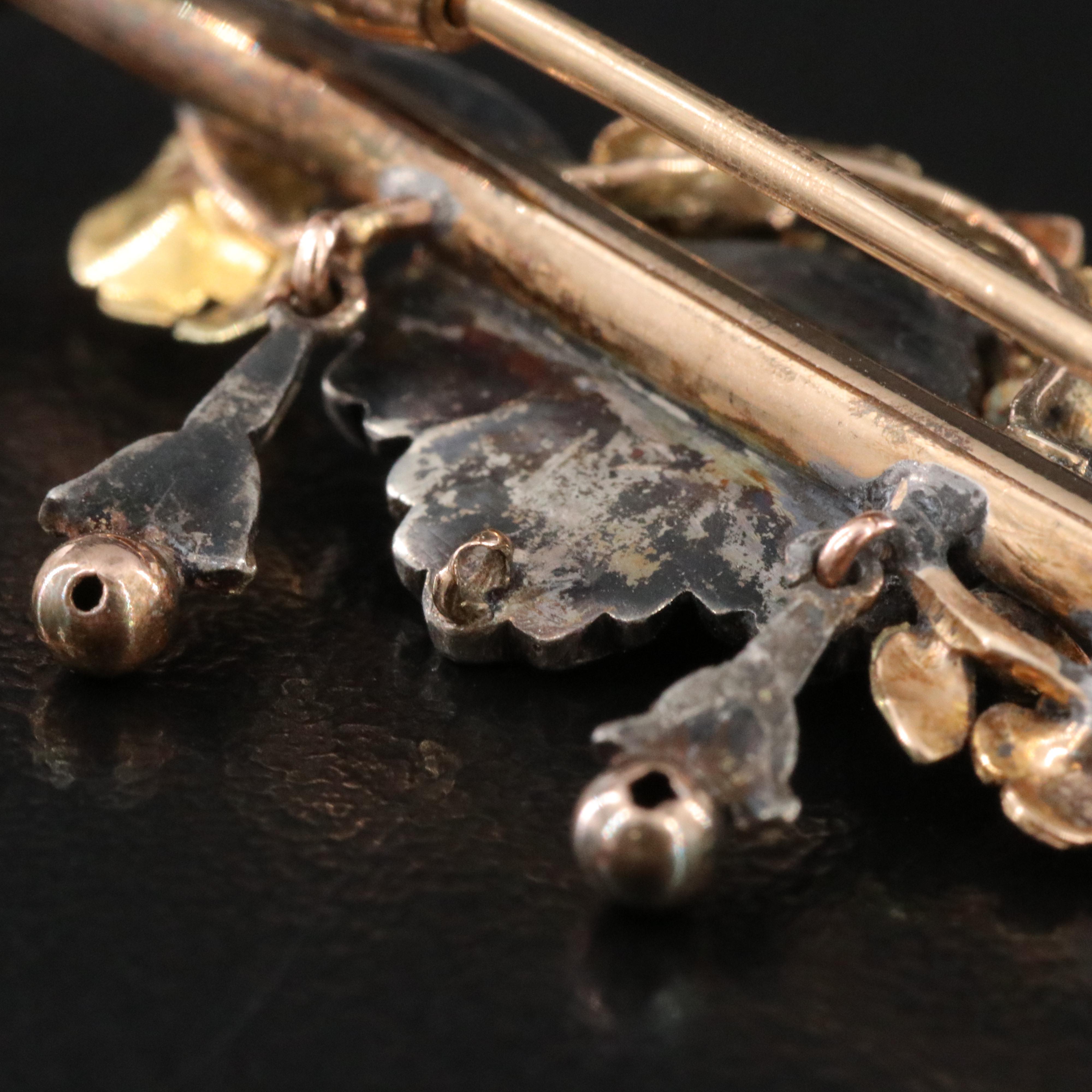 Antique 14K and 900 Silver Putto Bar Pin with Green Gold Accents