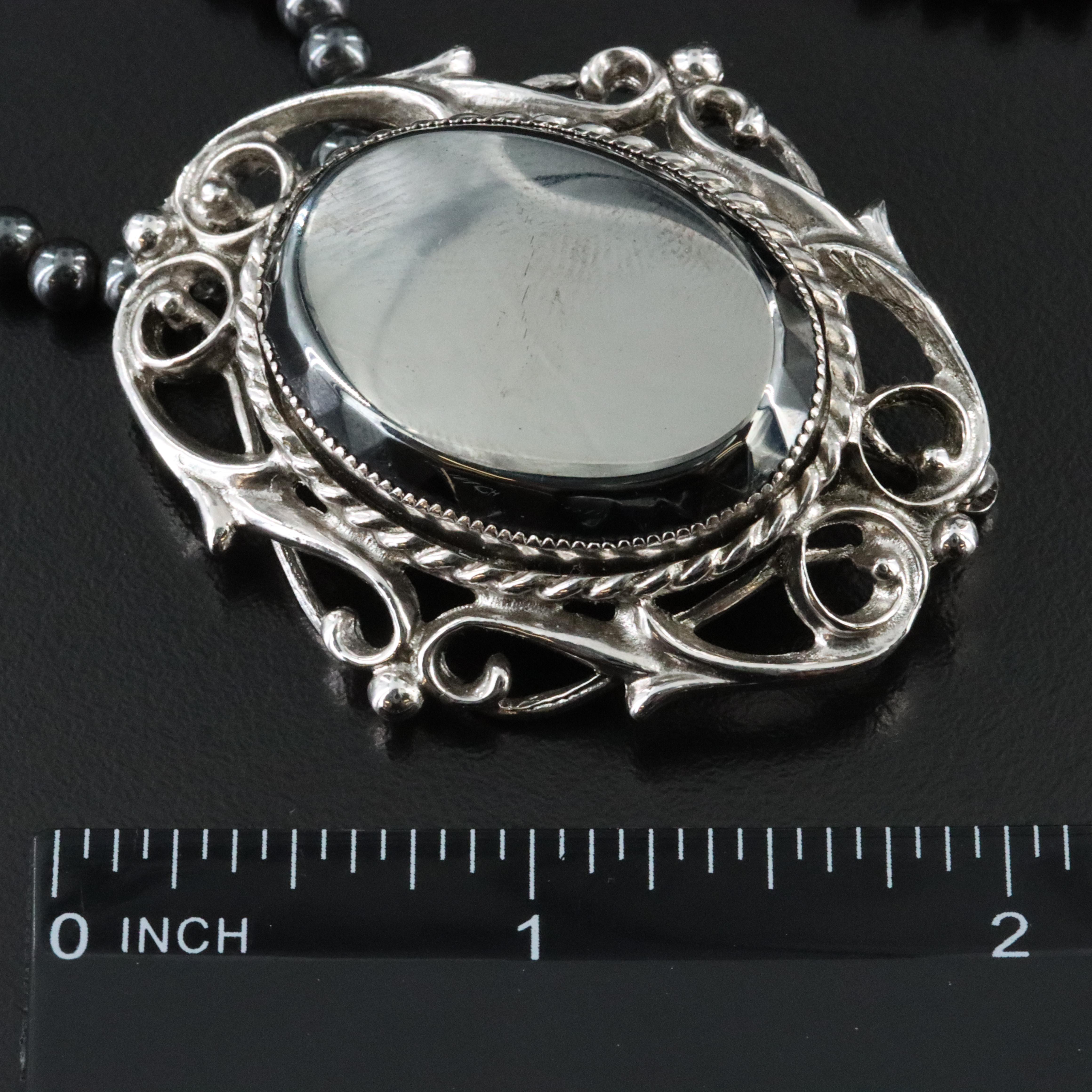 Brooch on Hematite Bead Necklace