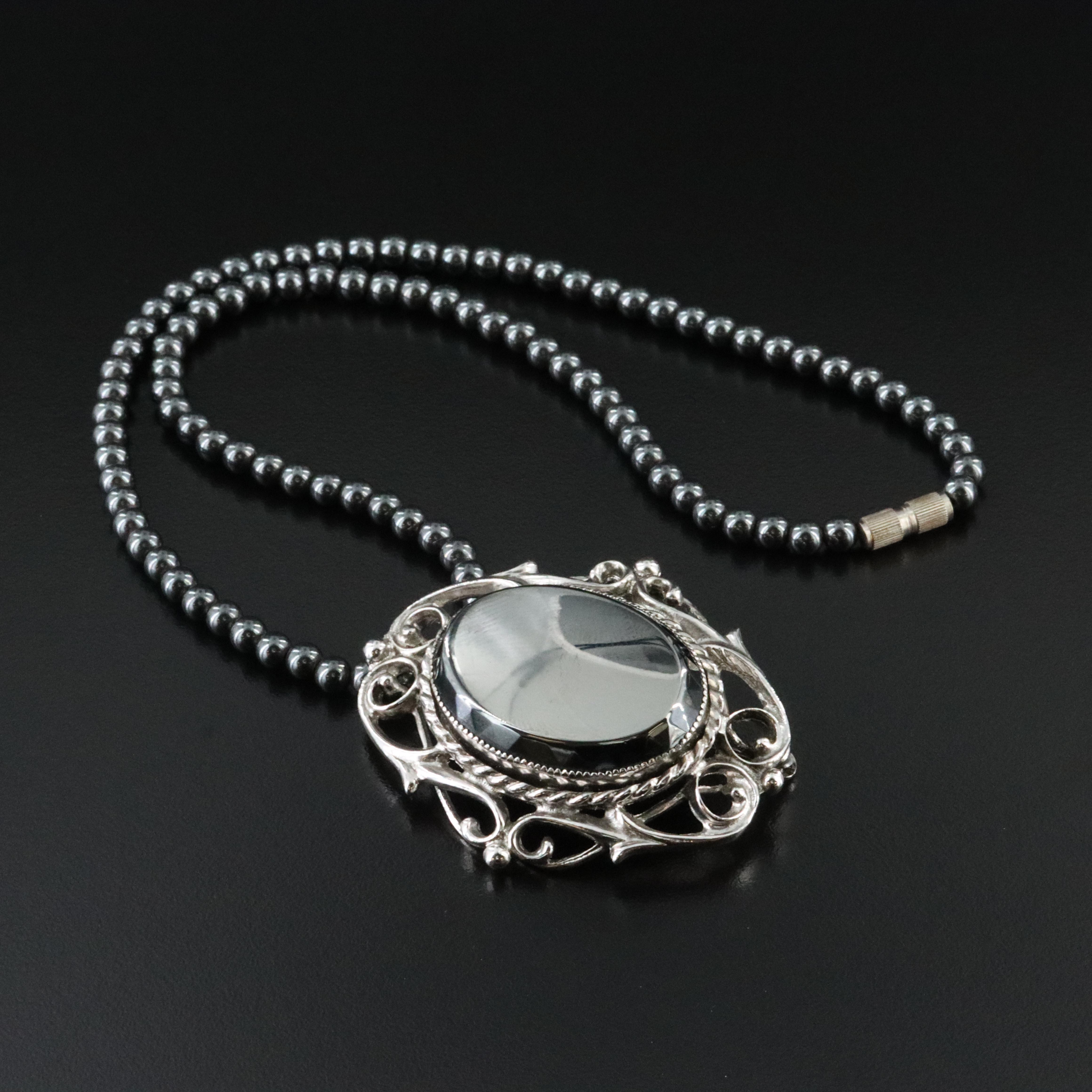 Brooch on Hematite Bead Necklace