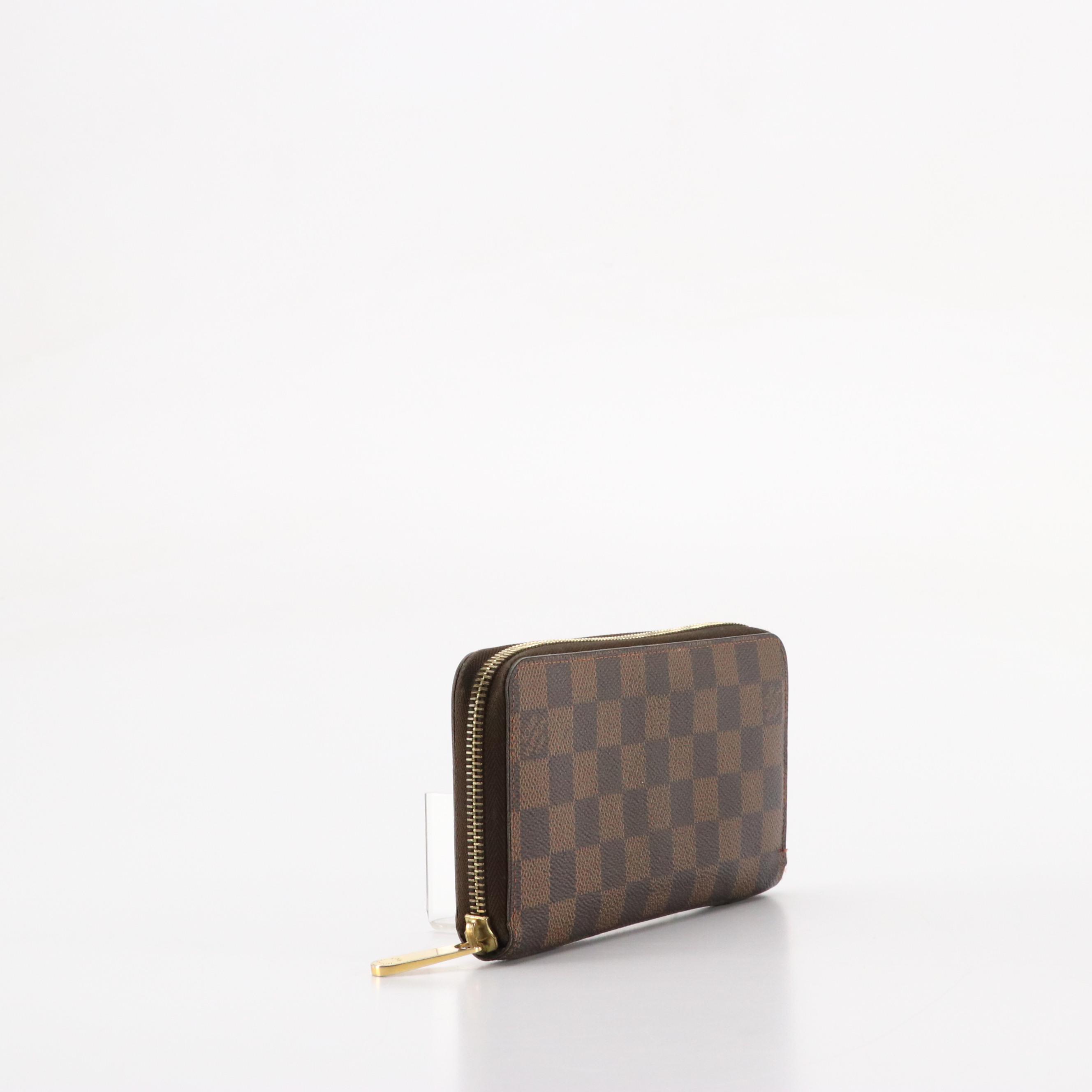 Louis Vuitton Zippy Wallet in Damier Ebene Canvas and Leather