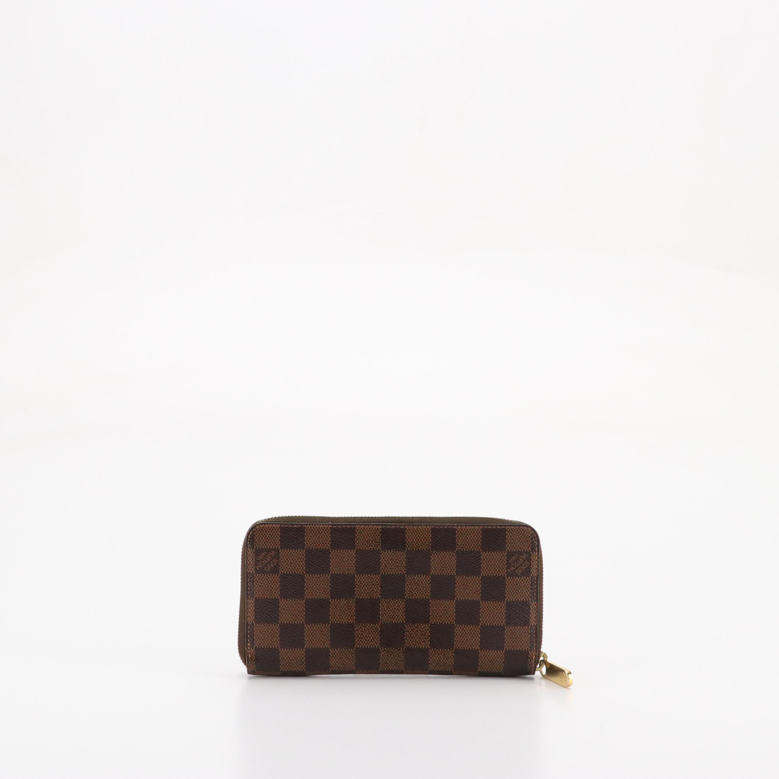 Louis Vuitton Zippy Wallet in Damier Ebene Canvas and Leather