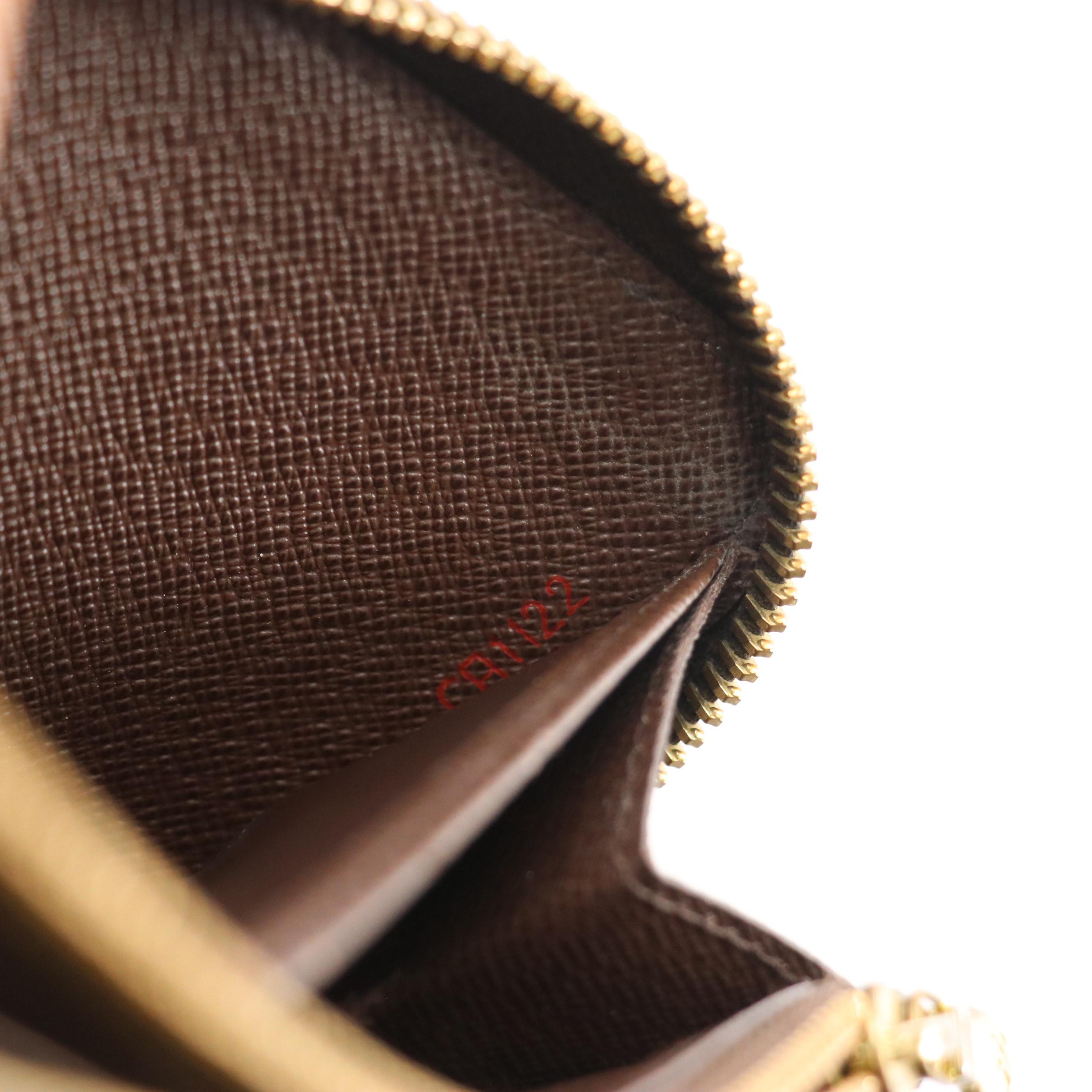 Louis Vuitton Zippy Wallet in Damier Ebene Canvas and Leather