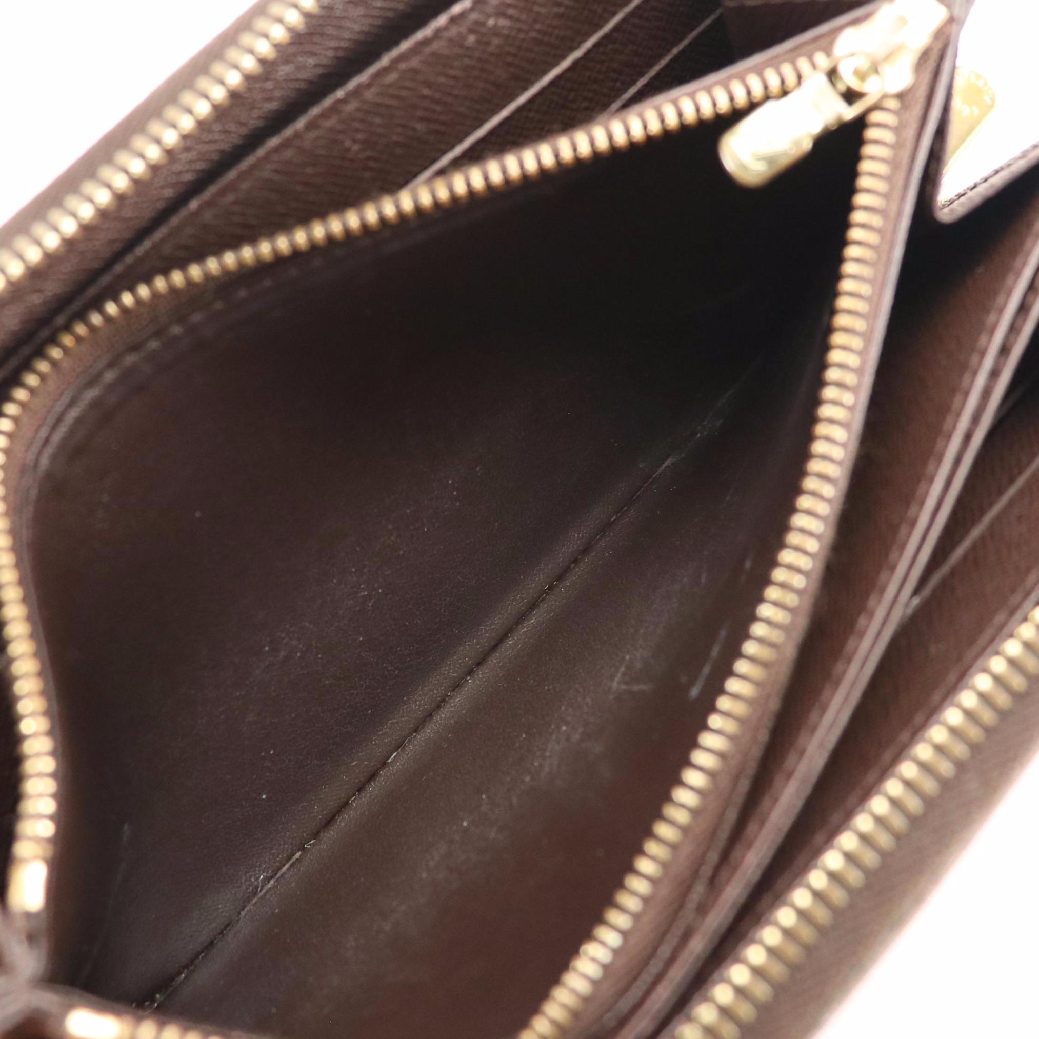 Louis Vuitton Zippy Wallet in Damier Ebene Canvas and Leather