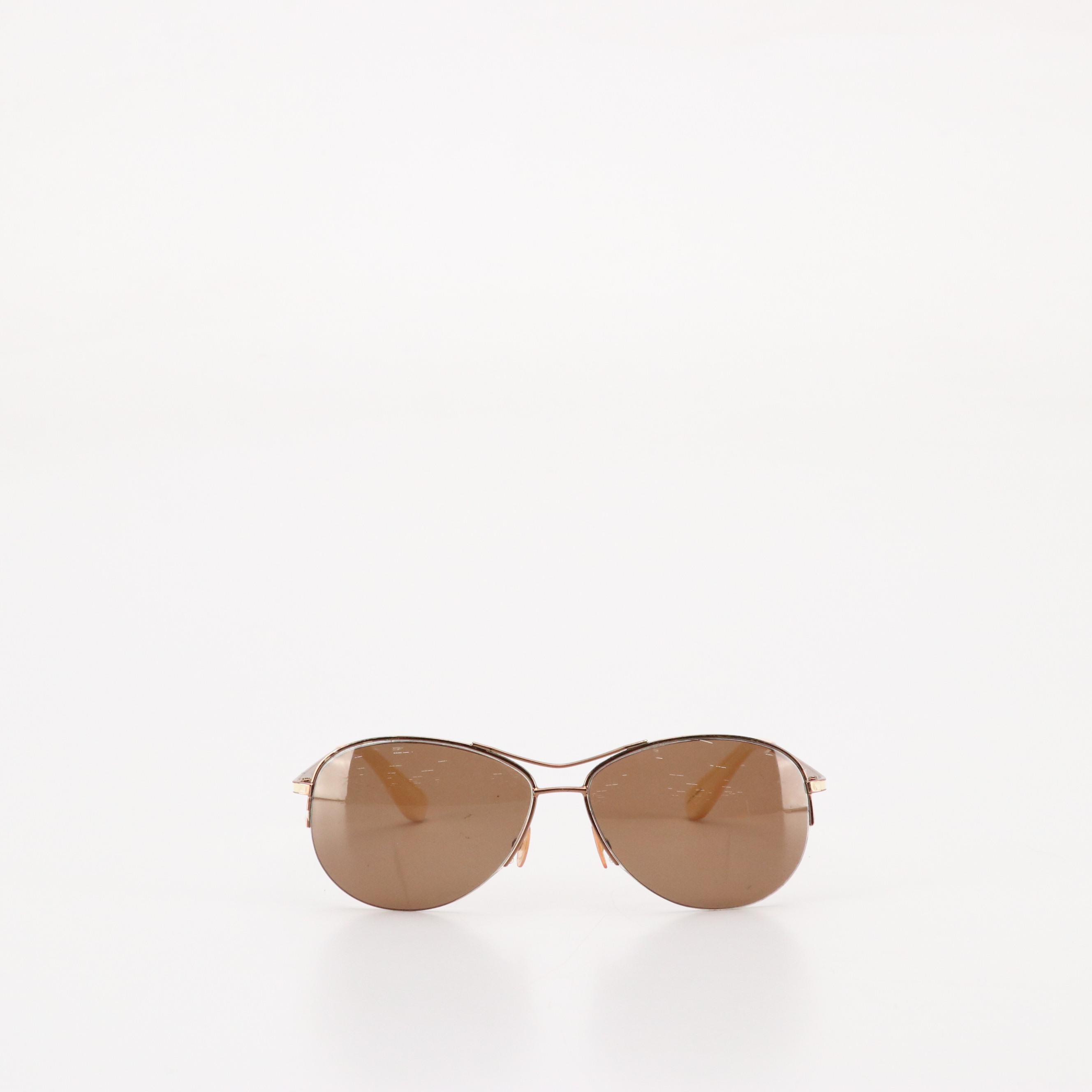 Salvatore Ferragamo Gancini Sunglasses, Anna Sui Oval Sunglasses, and More