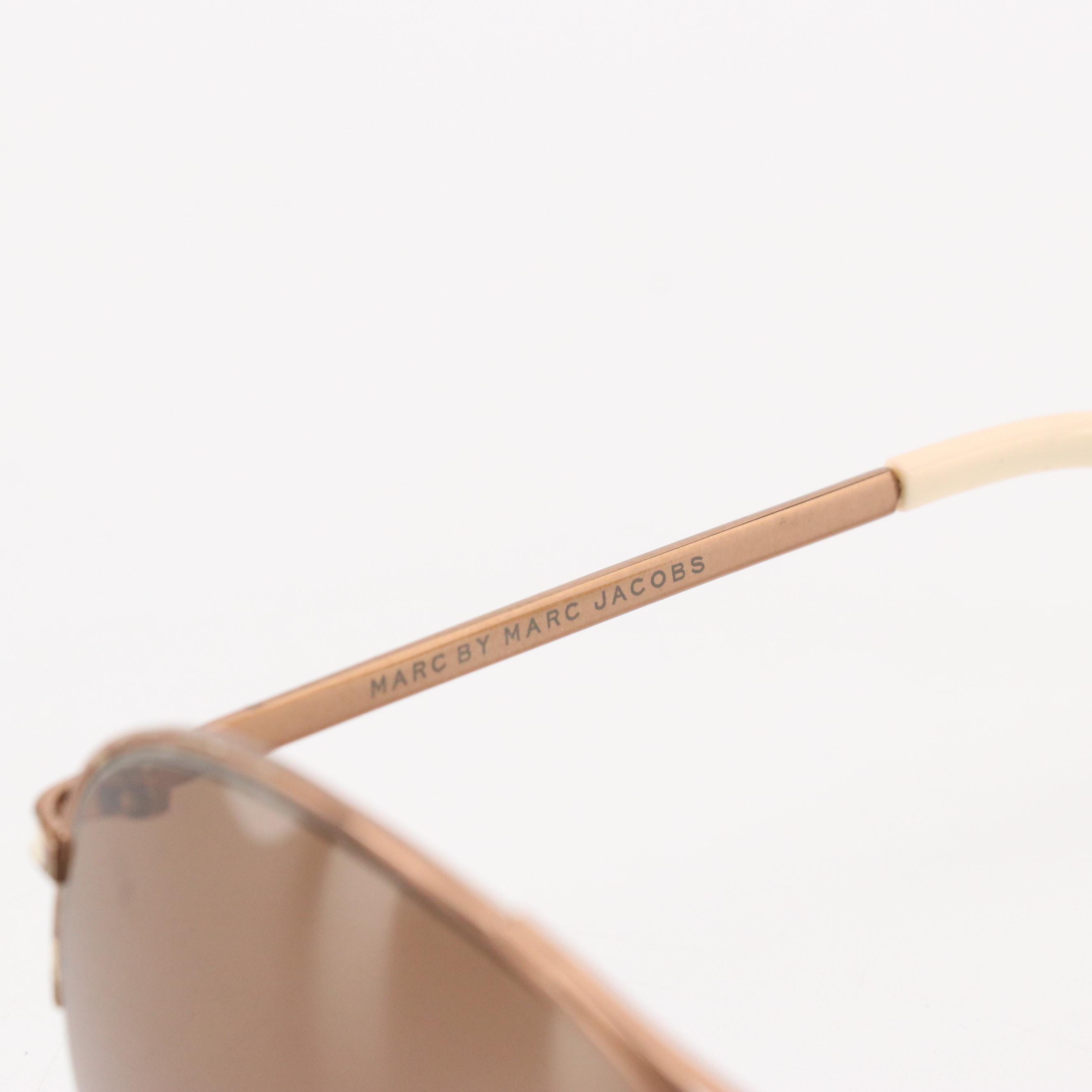 Salvatore Ferragamo Gancini Sunglasses, Anna Sui Oval Sunglasses, and More